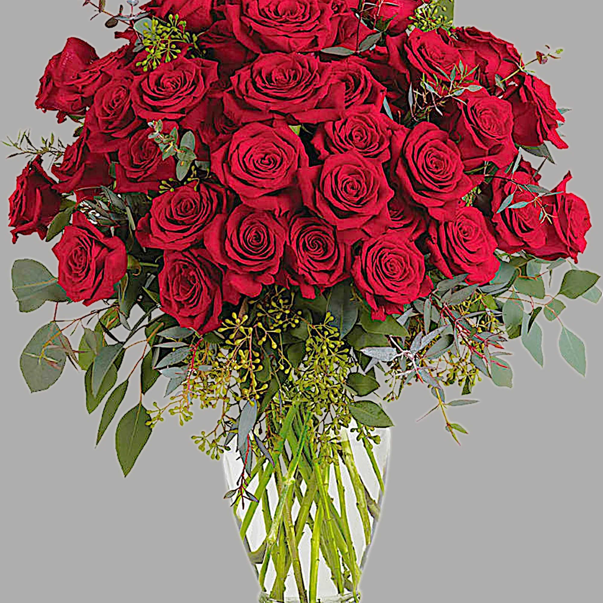 Bouquet of red roses in a clear glass vase, photo 5 of 5