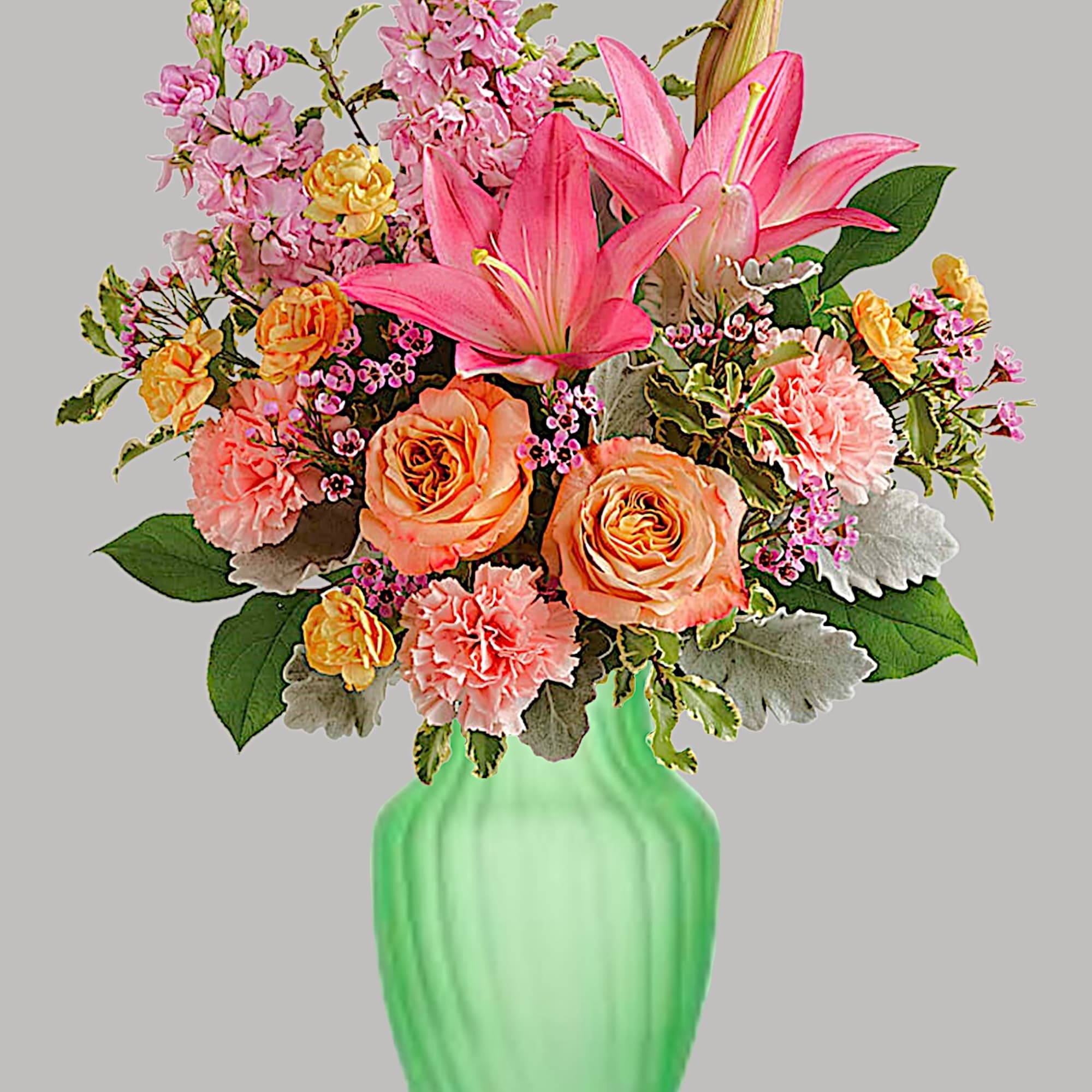 Pink lilies and peach roses arranged in a green vase, photo 4 of 4