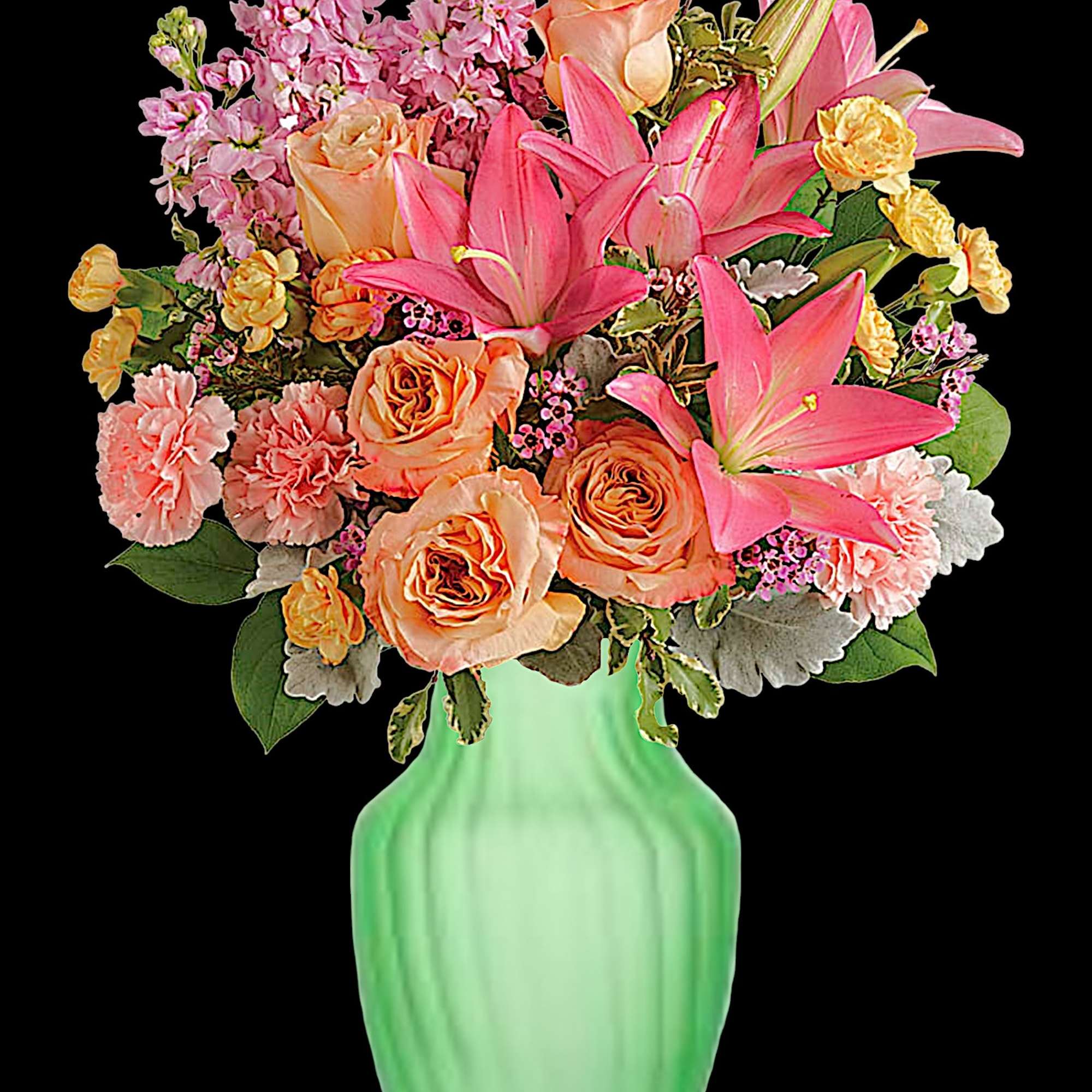 Pink lilies and peach roses arranged in a green vase