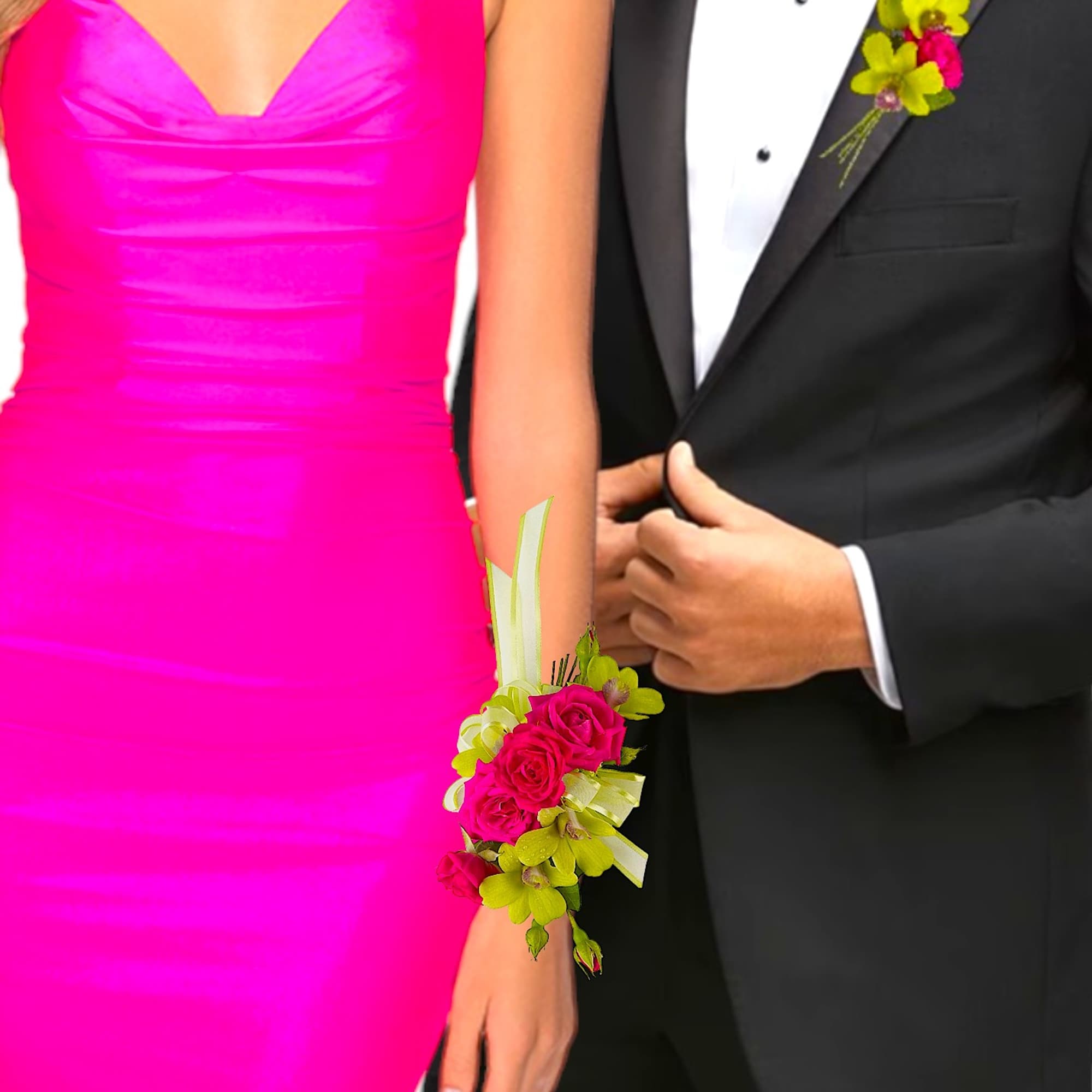 Couple in formalwear with a pink floral wrist corsage and boutonniere