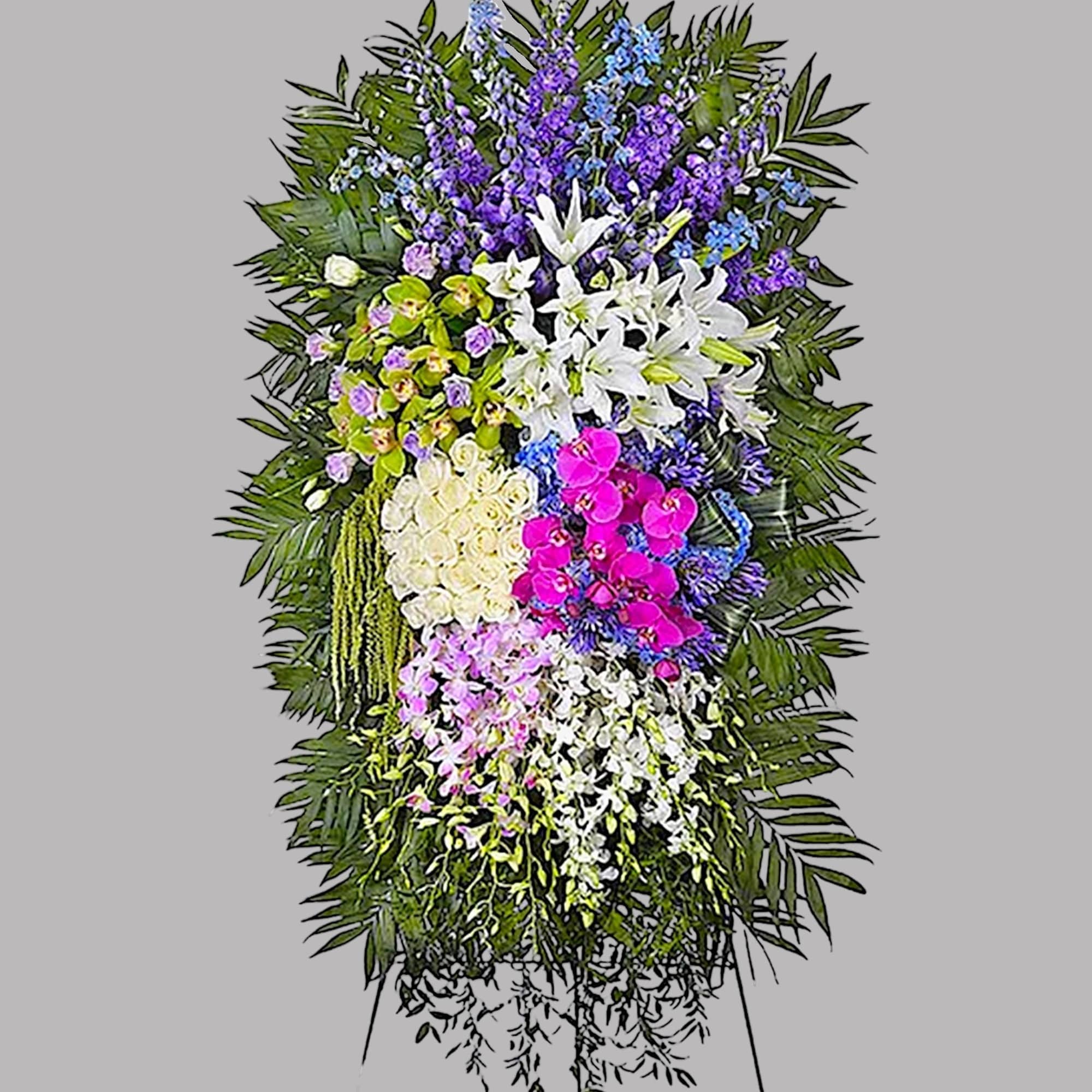 Standing floral spray with white lilies, orchids, and purple flowers