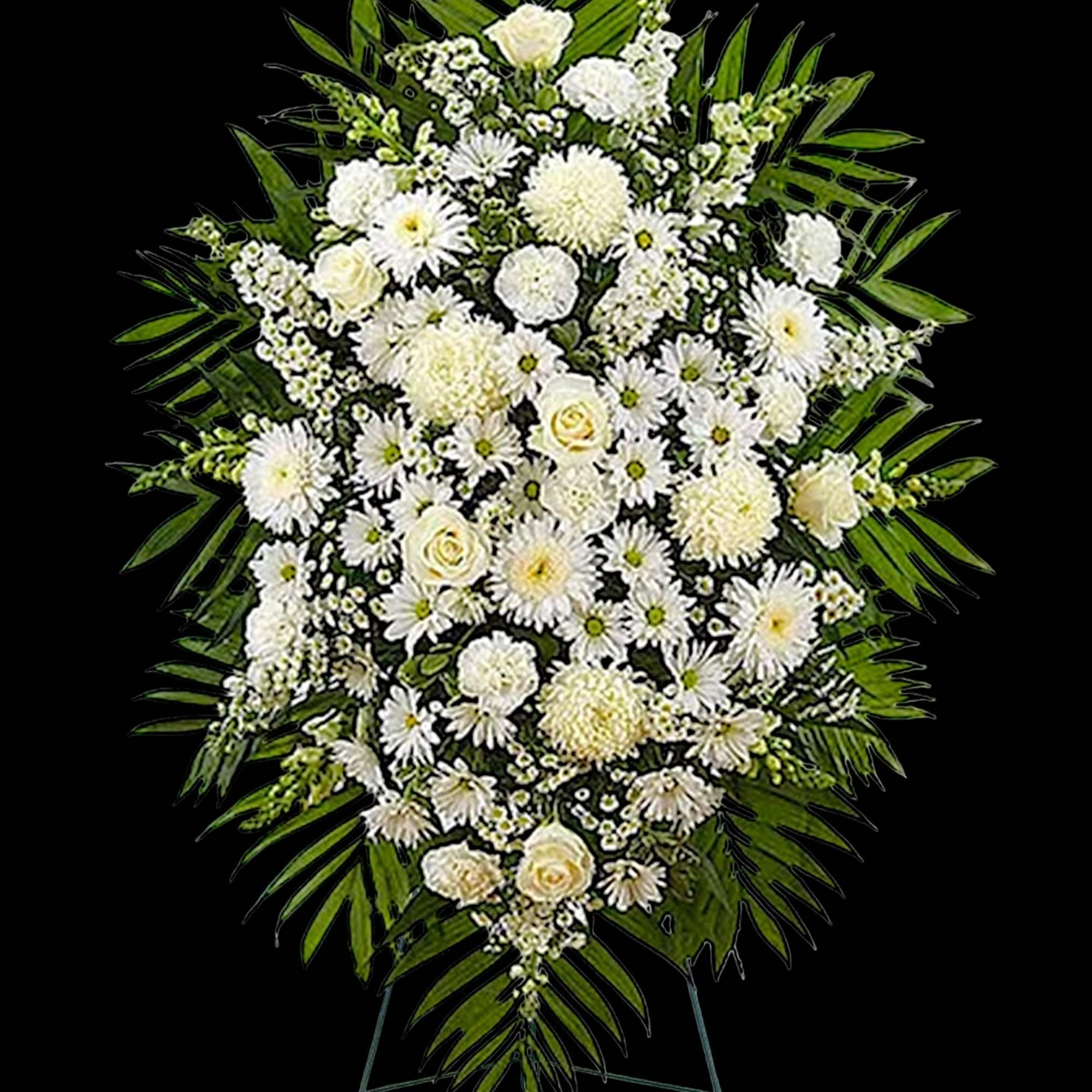 White floral standing spray with palm fronds on an easel