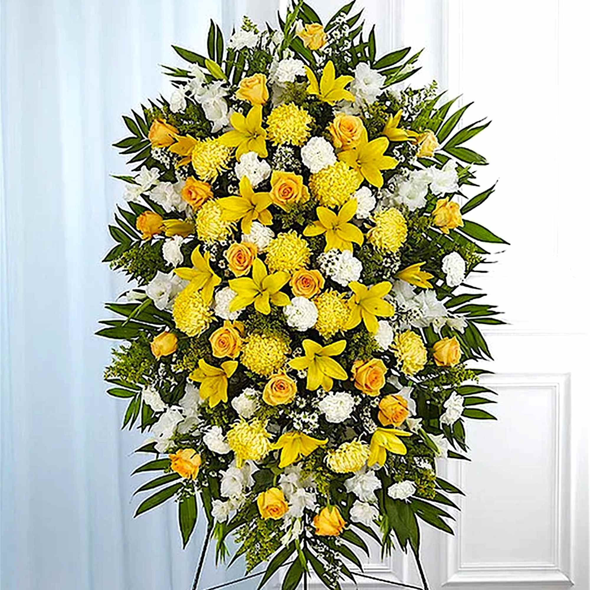 Standing floral spray with yellow and white flowers on an easel, photo 3 of 6