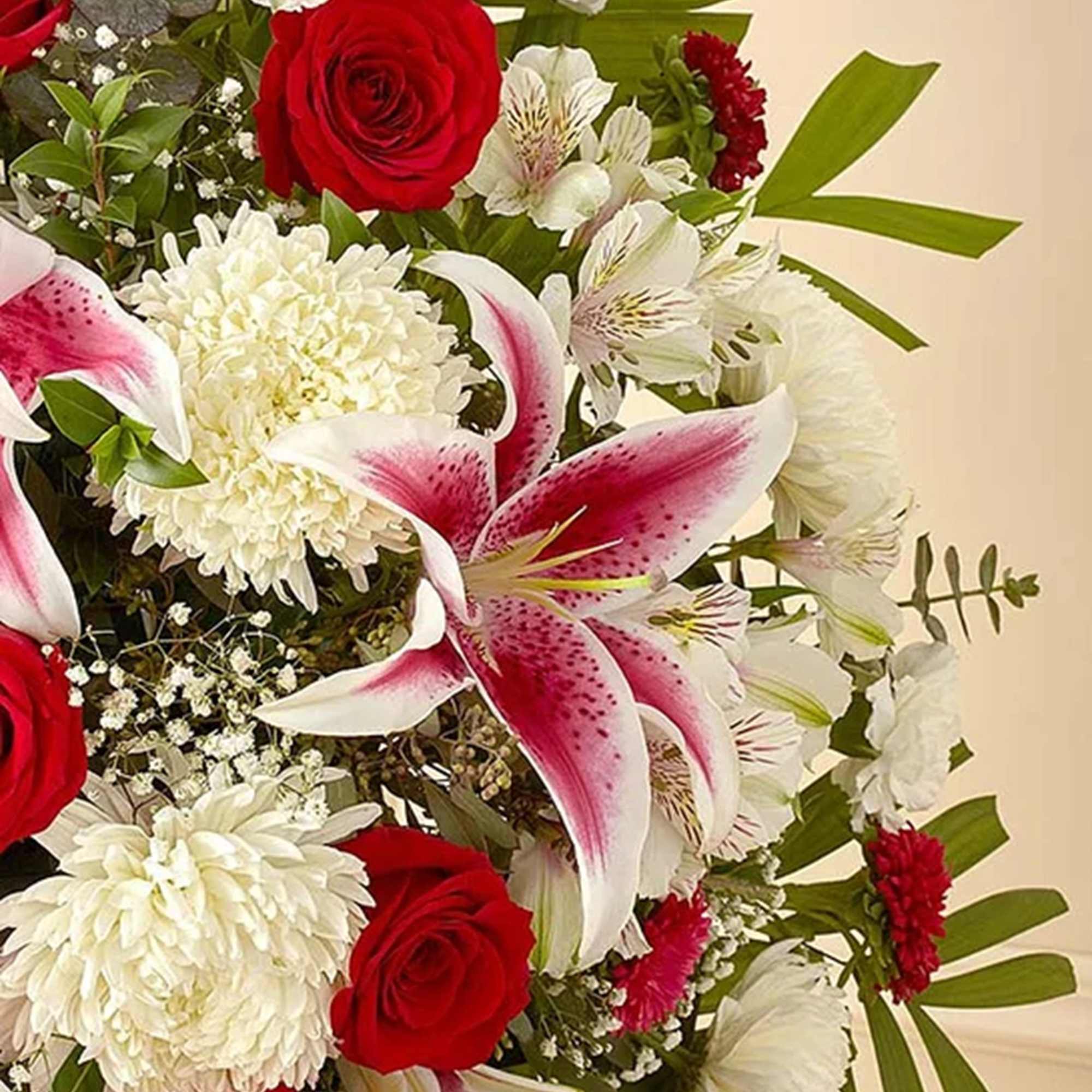 Bouquet of red roses, white lilies, and white chrysanthemums