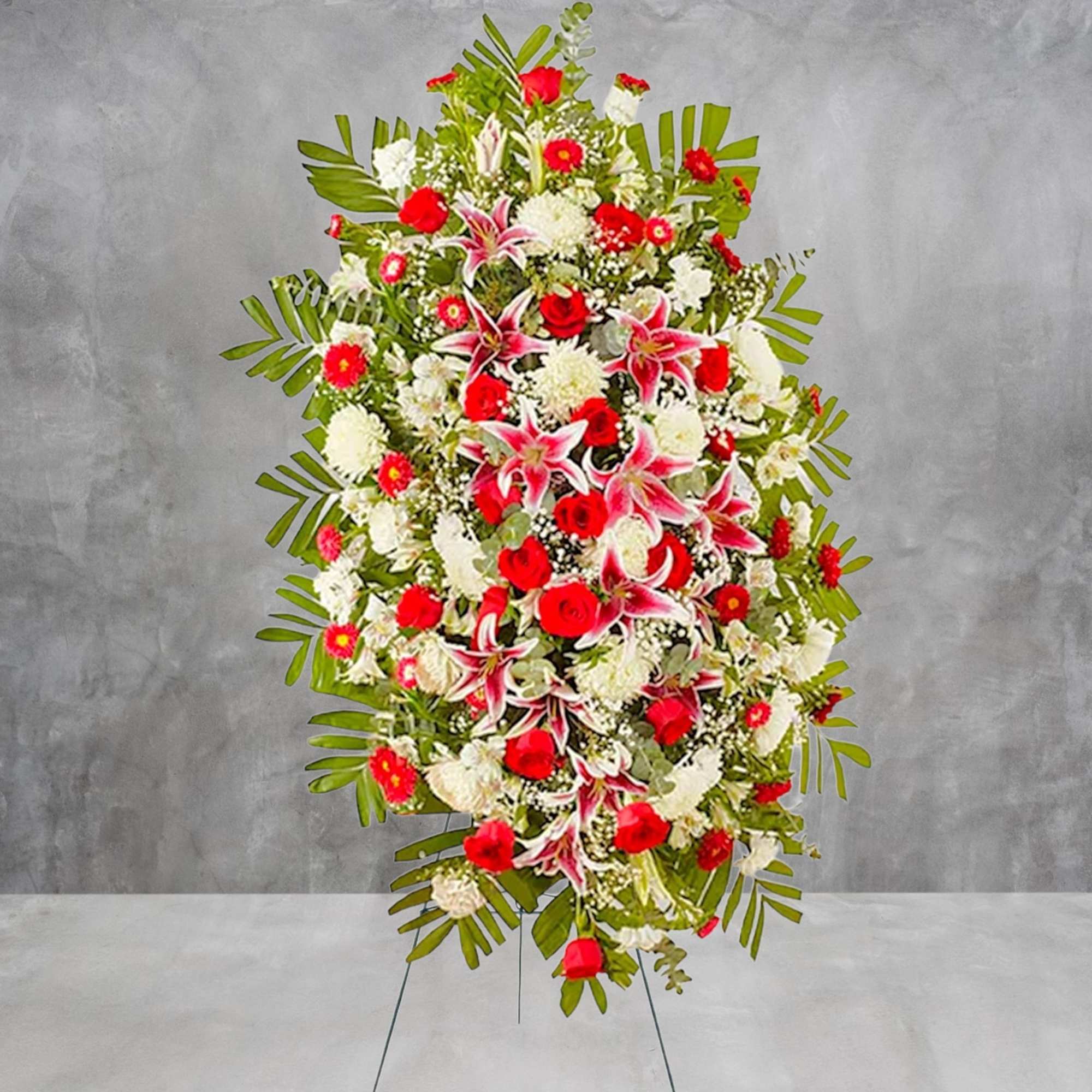 Tall standing floral spray with red and white flowers