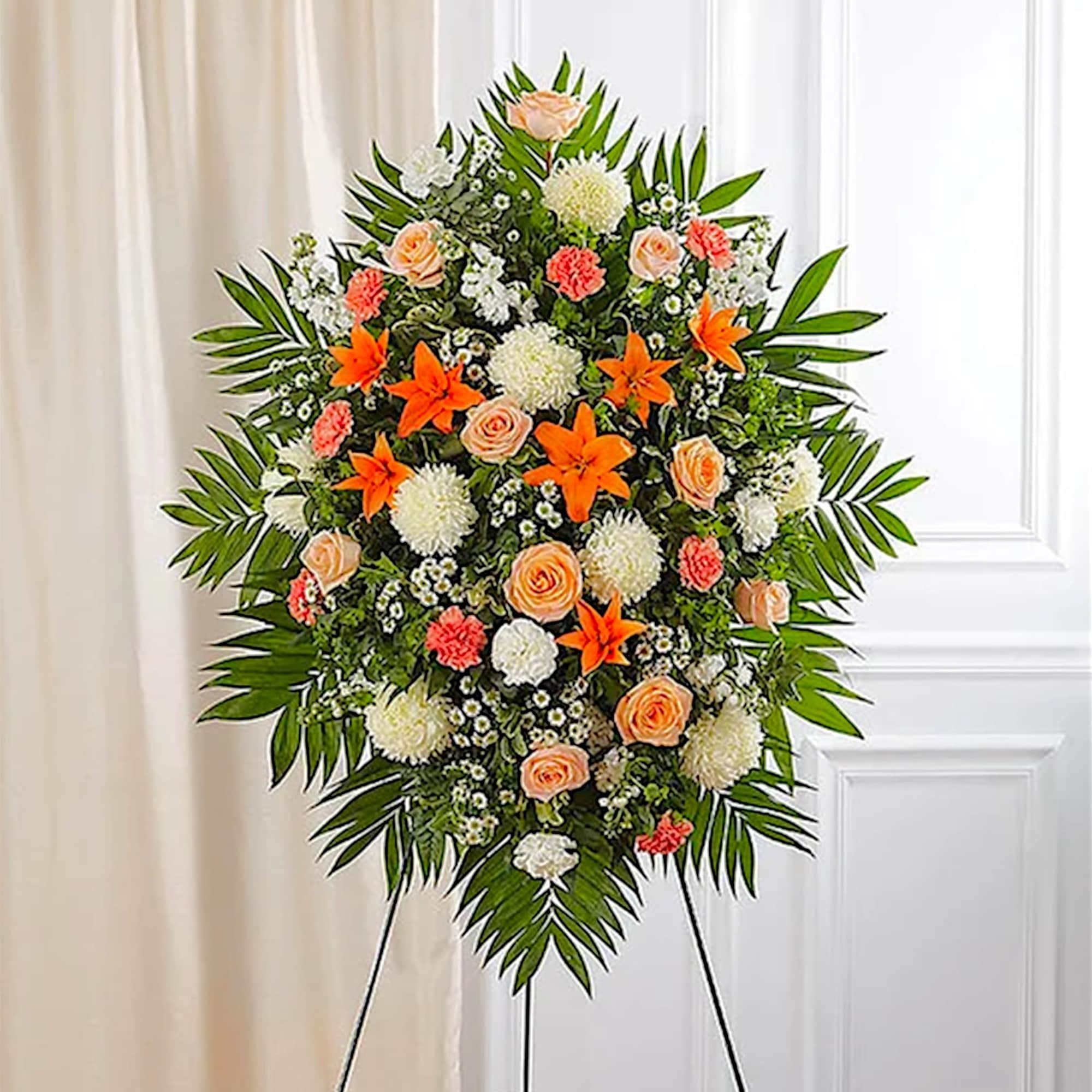 Standing floral spray with peach roses, orange lilies, and white blooms, photo 2 of 5