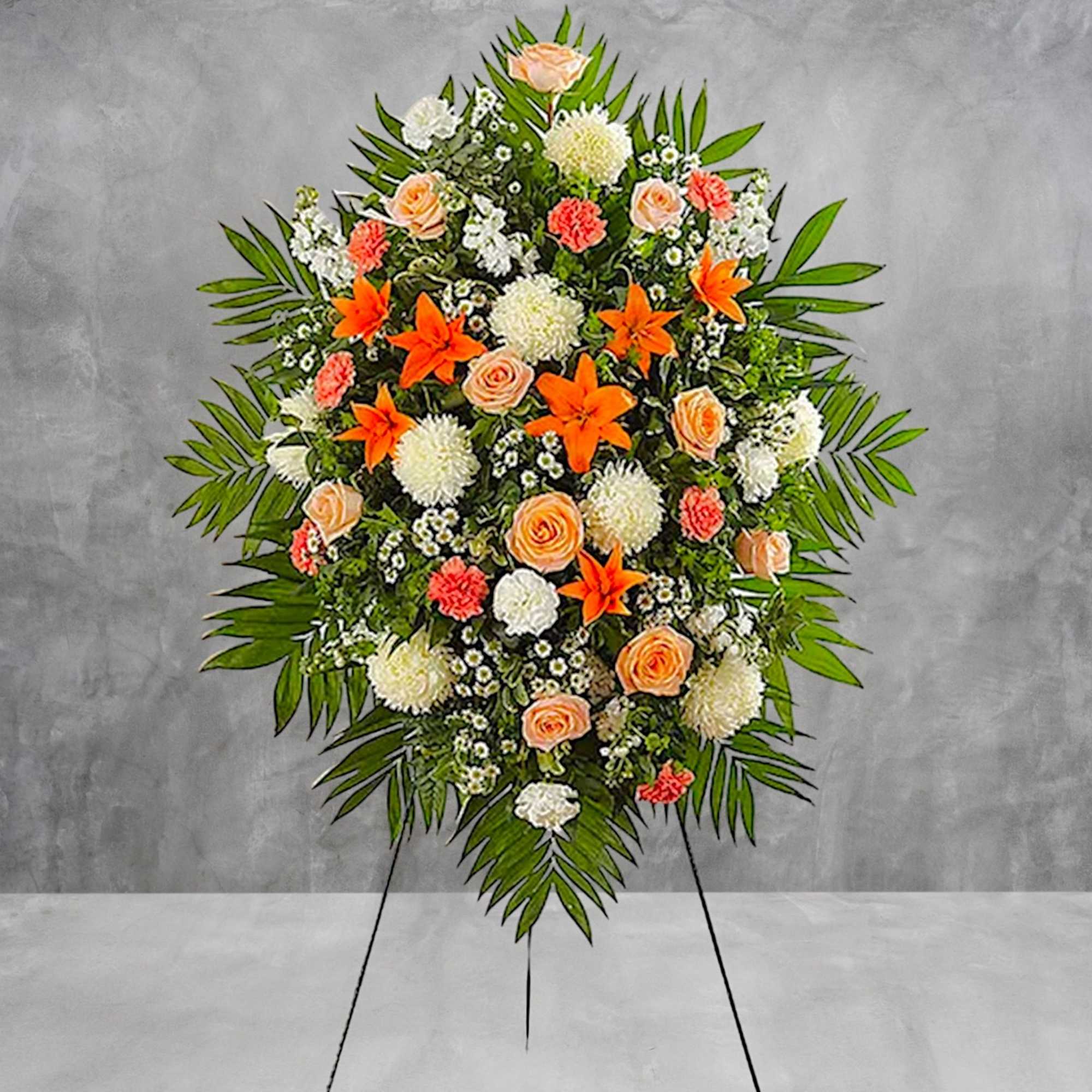 Standing floral spray with orange lilies, peach roses, and white blooms, photo 3 of 5