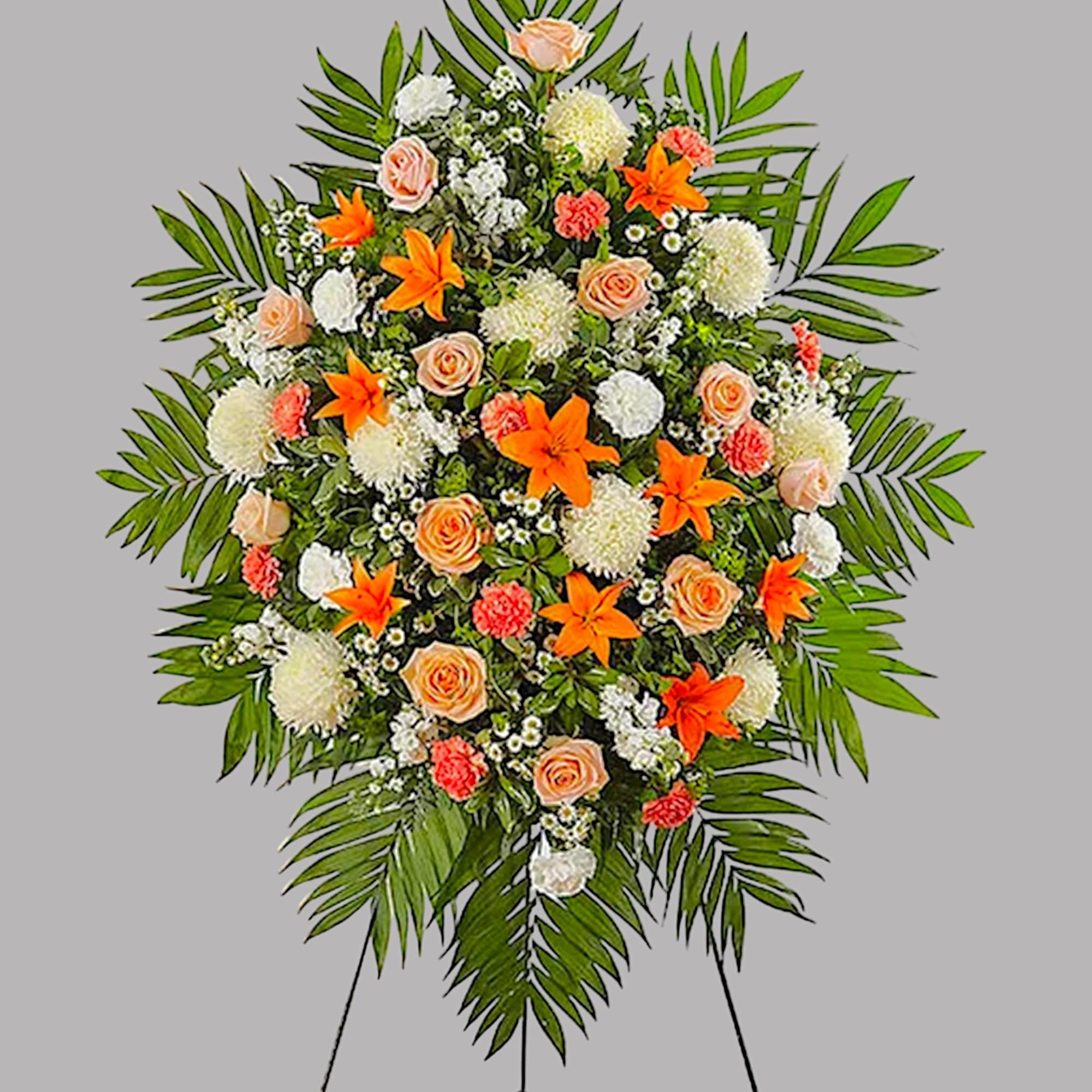 Standing floral spray with orange lilies, peach roses, and white blooms, photo 5 of 5