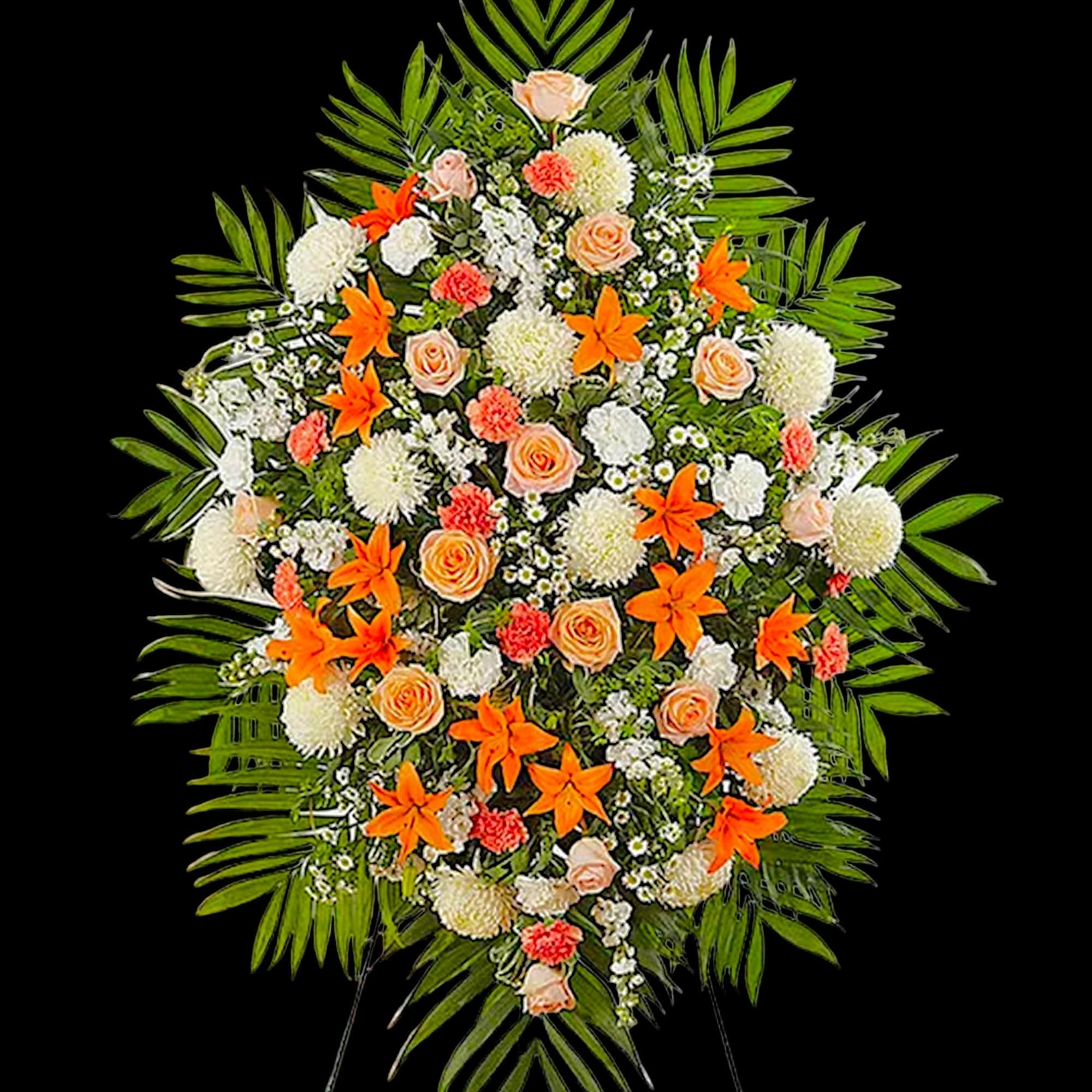 Large standing floral spray with orange and peach flowers on a black background