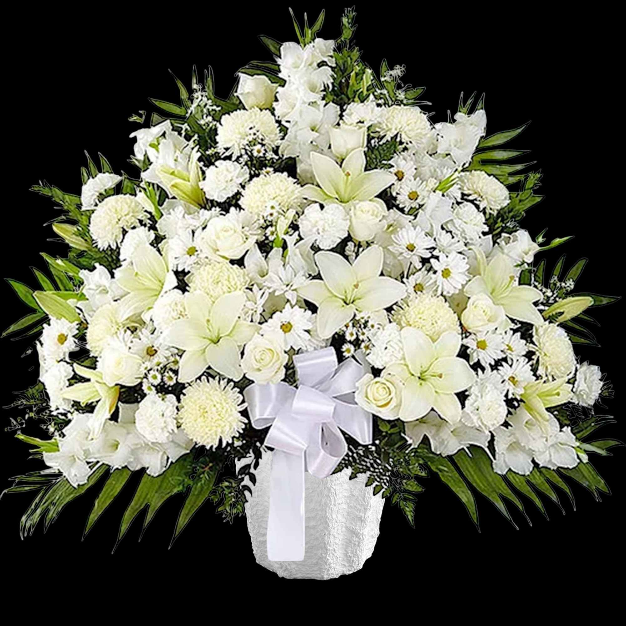 White floral arrangement in a white vase with a ribbon bow
