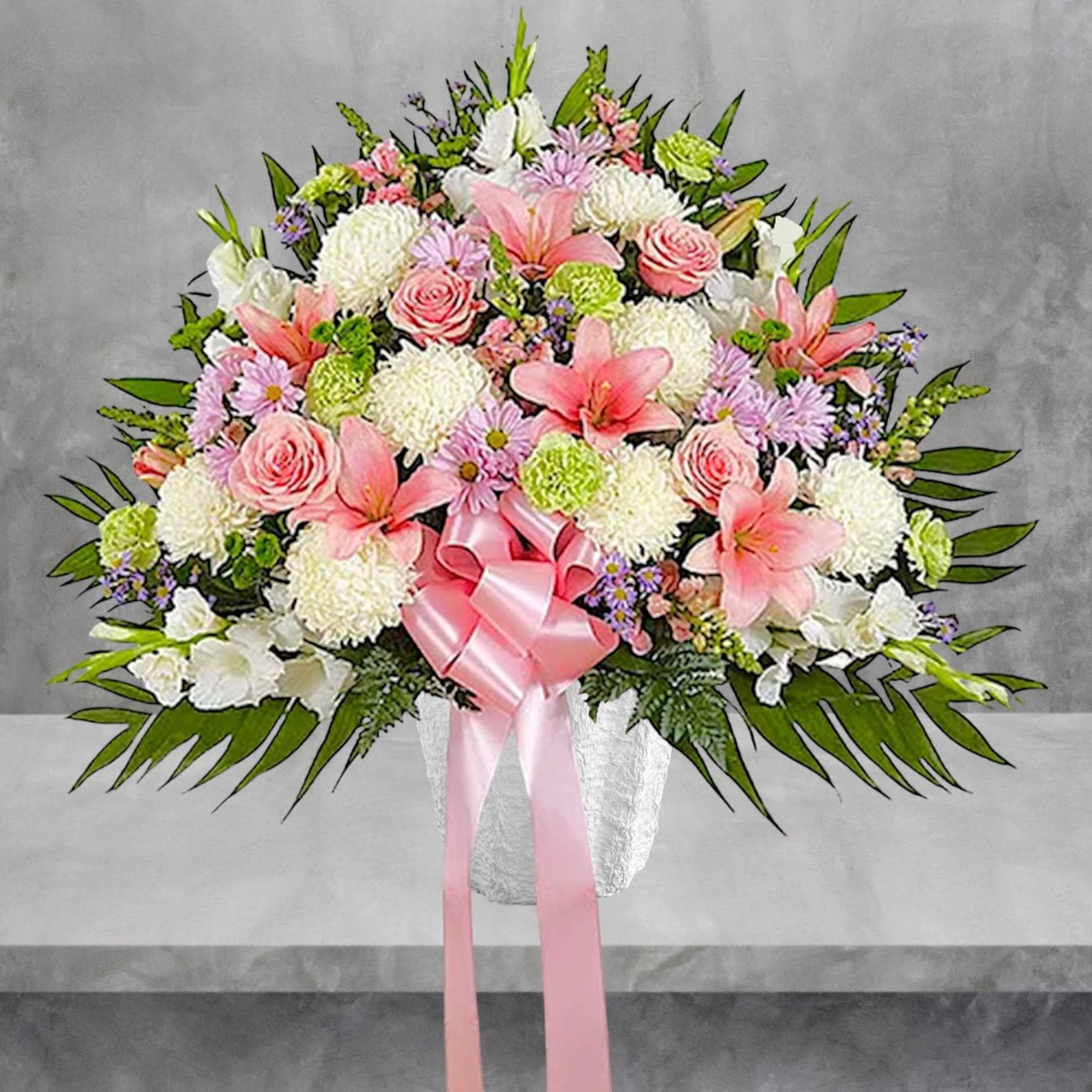 Pink and white floral arrangement in a white vase with a pink ribbon, photo 4 of 6