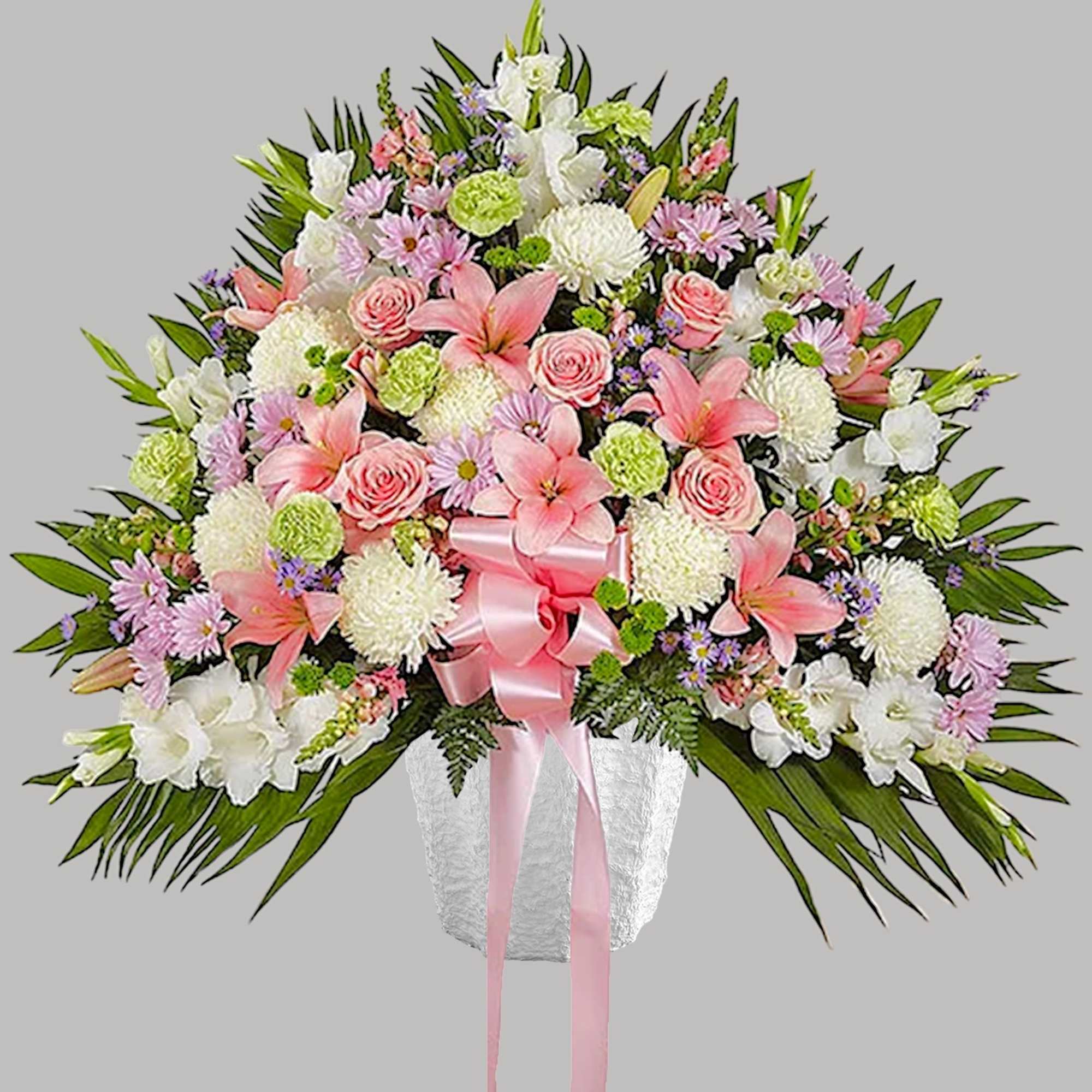 Large pink and white floral spray in a white vase with a pink ribbon, photo 6 of 6