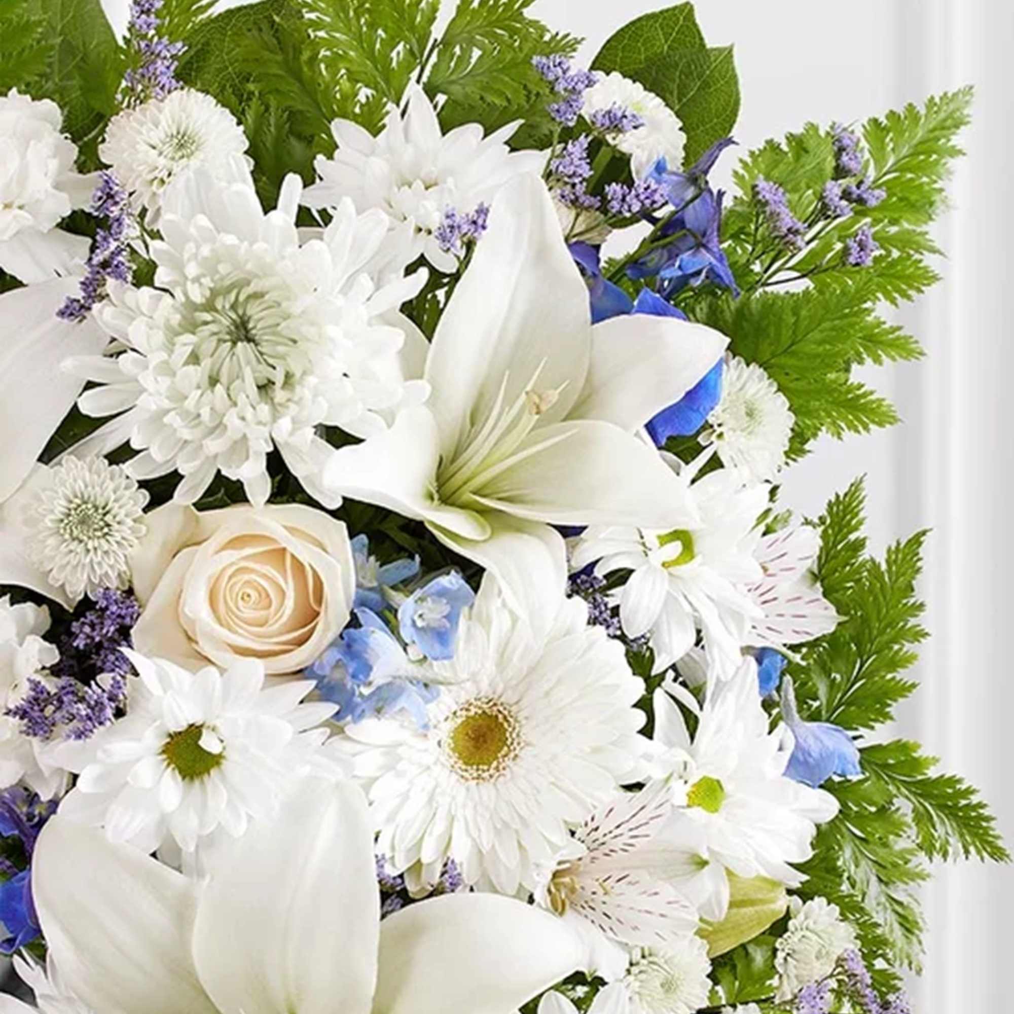 Offer solace with a sentimental arrangement for the services. The square wreath