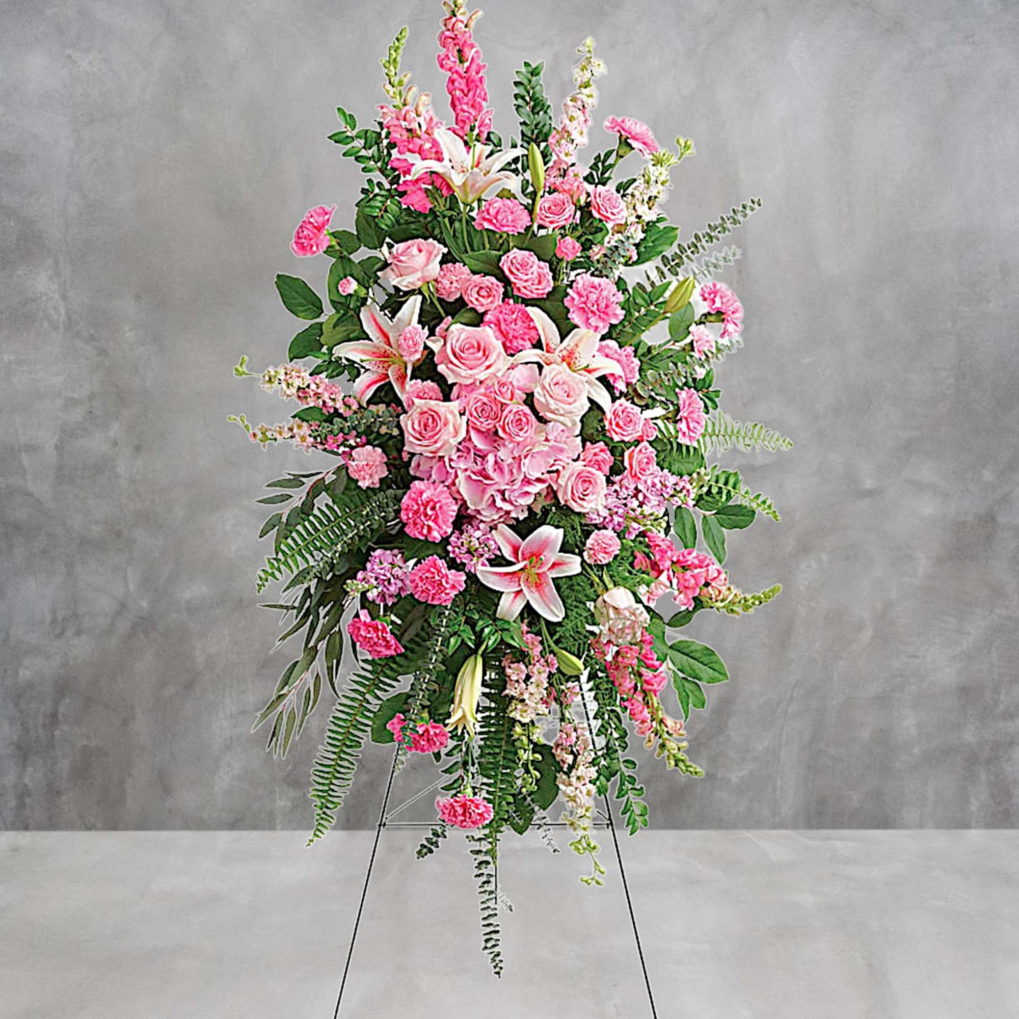 Glorify a life well-lived with this magnificent spray of pink hydrangea, roses