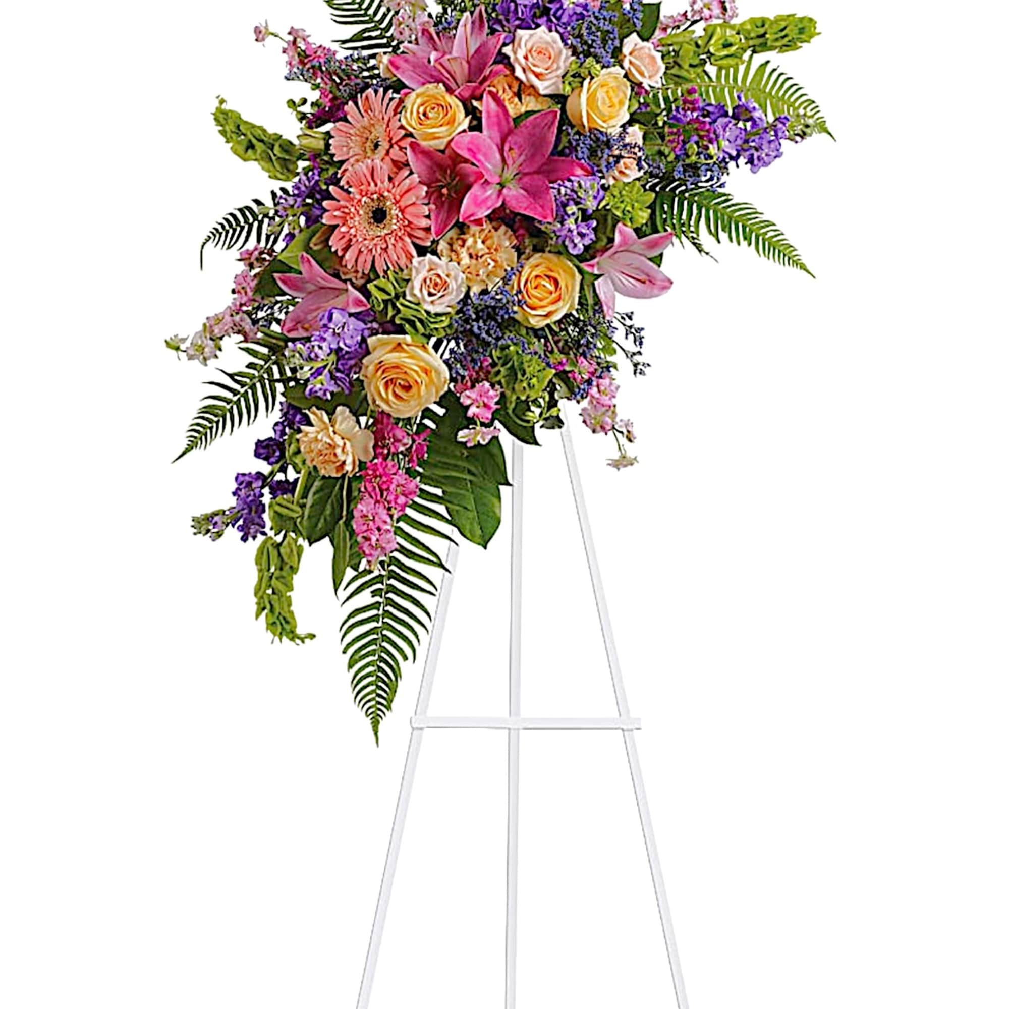 Tall floral spray on a white easel with pink, purple, and peach blooms