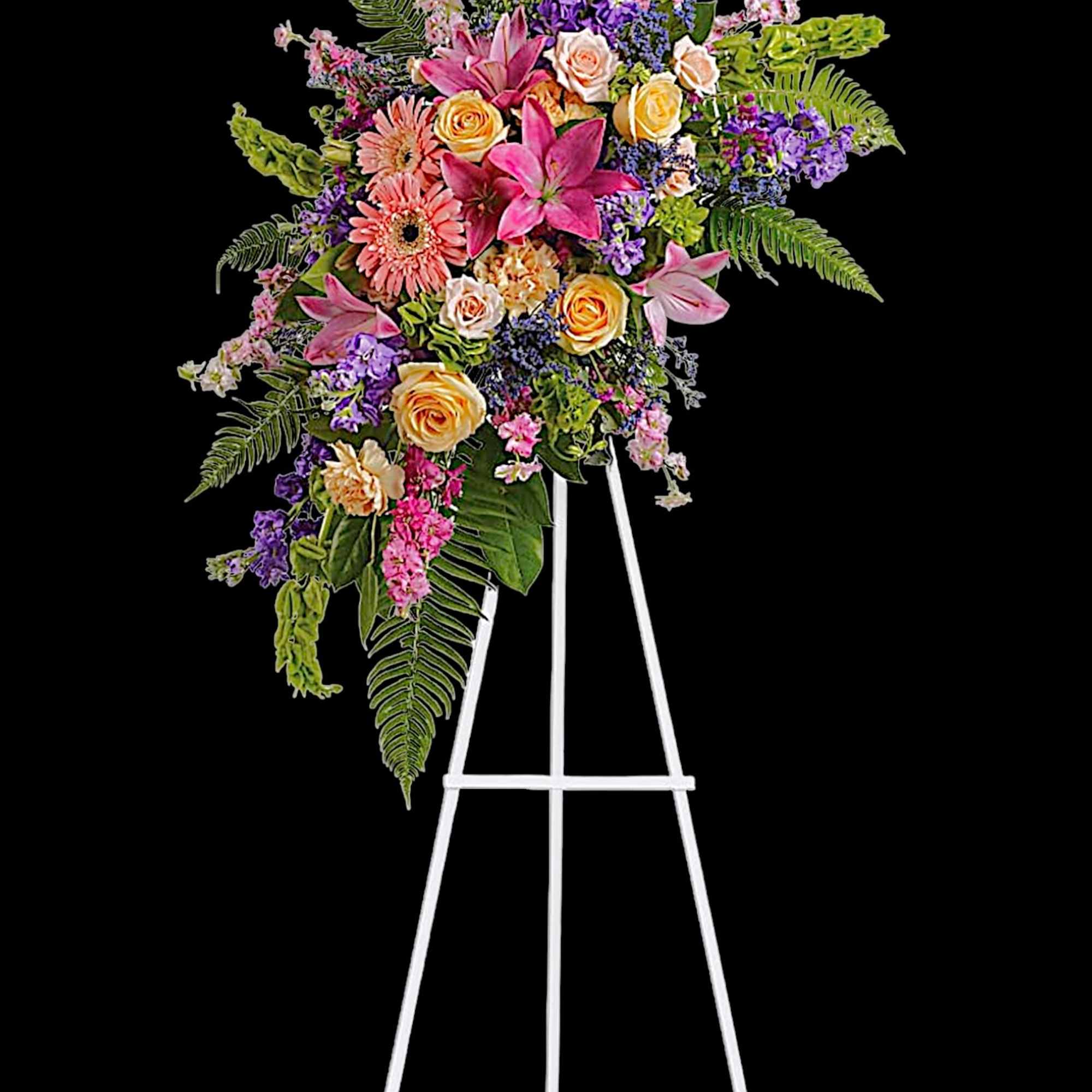 Large floral spray on a white easel with pink, purple, and yellow blooms