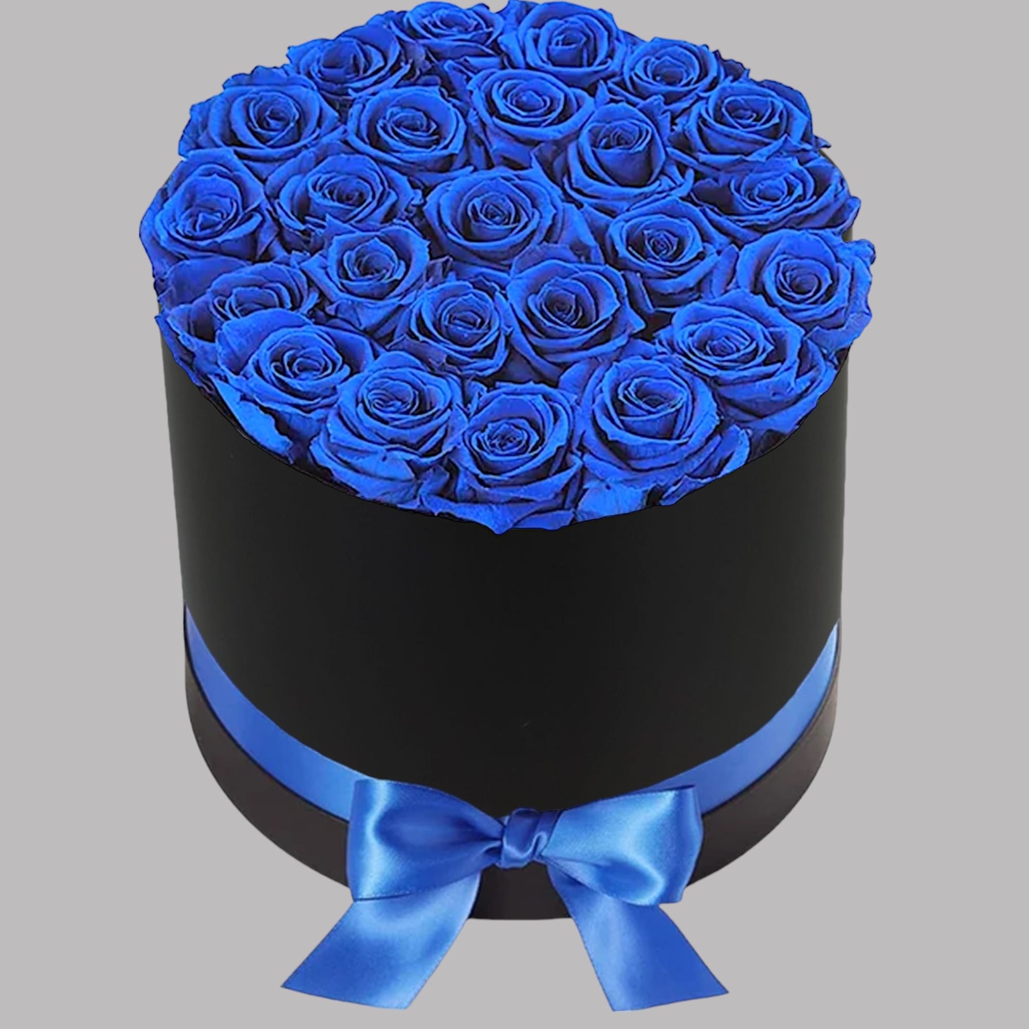 Blue roses arranged in a black round box with a blue ribbon bow, photo 4 of 4