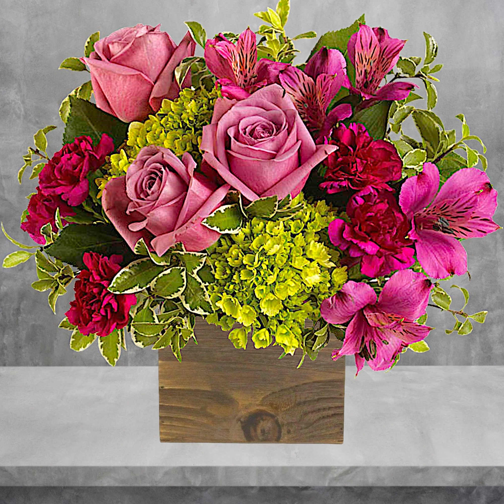 Pink roses and magenta alstroemeria in a wooden box, photo 2 of 4