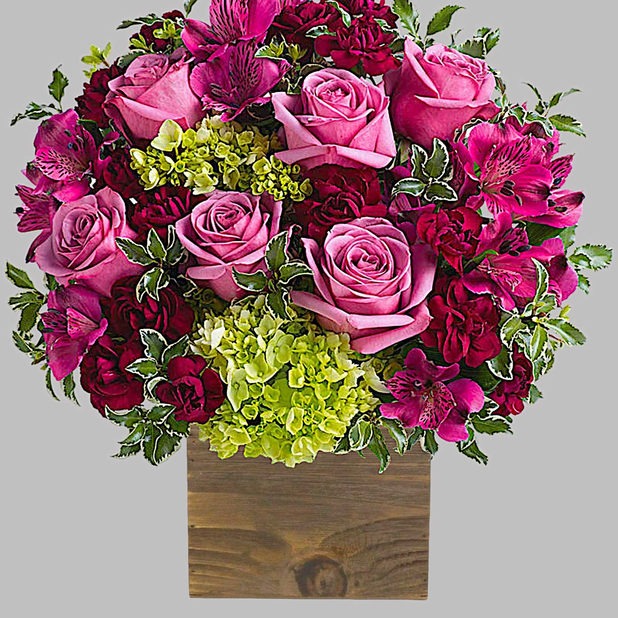 Pink roses and magenta flowers arranged in a wooden box, photo 4 of 4
