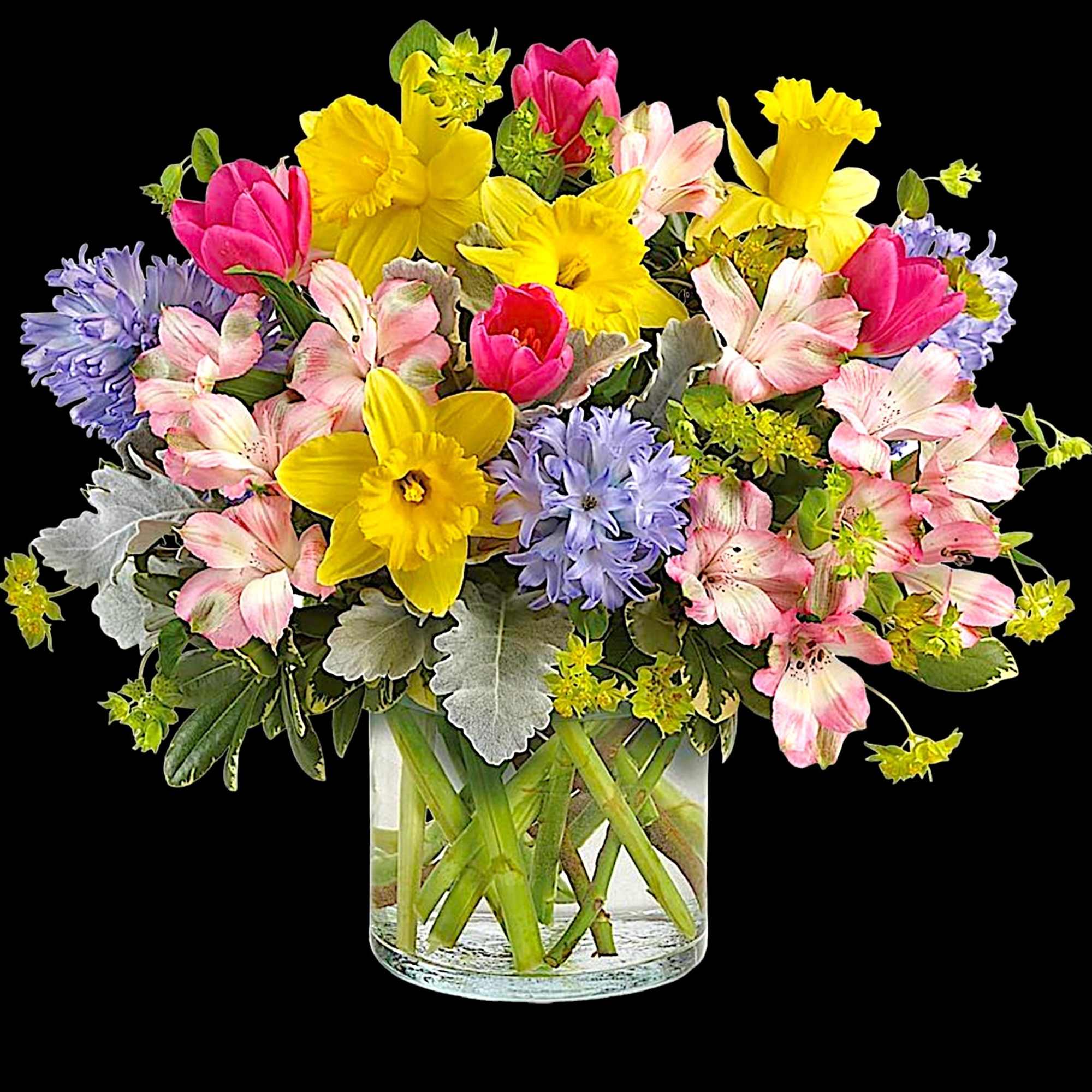 Mixed bouquet of yellow daffodils, pink tulips, and lavender flowers in a glass vase, photo 3 of 4