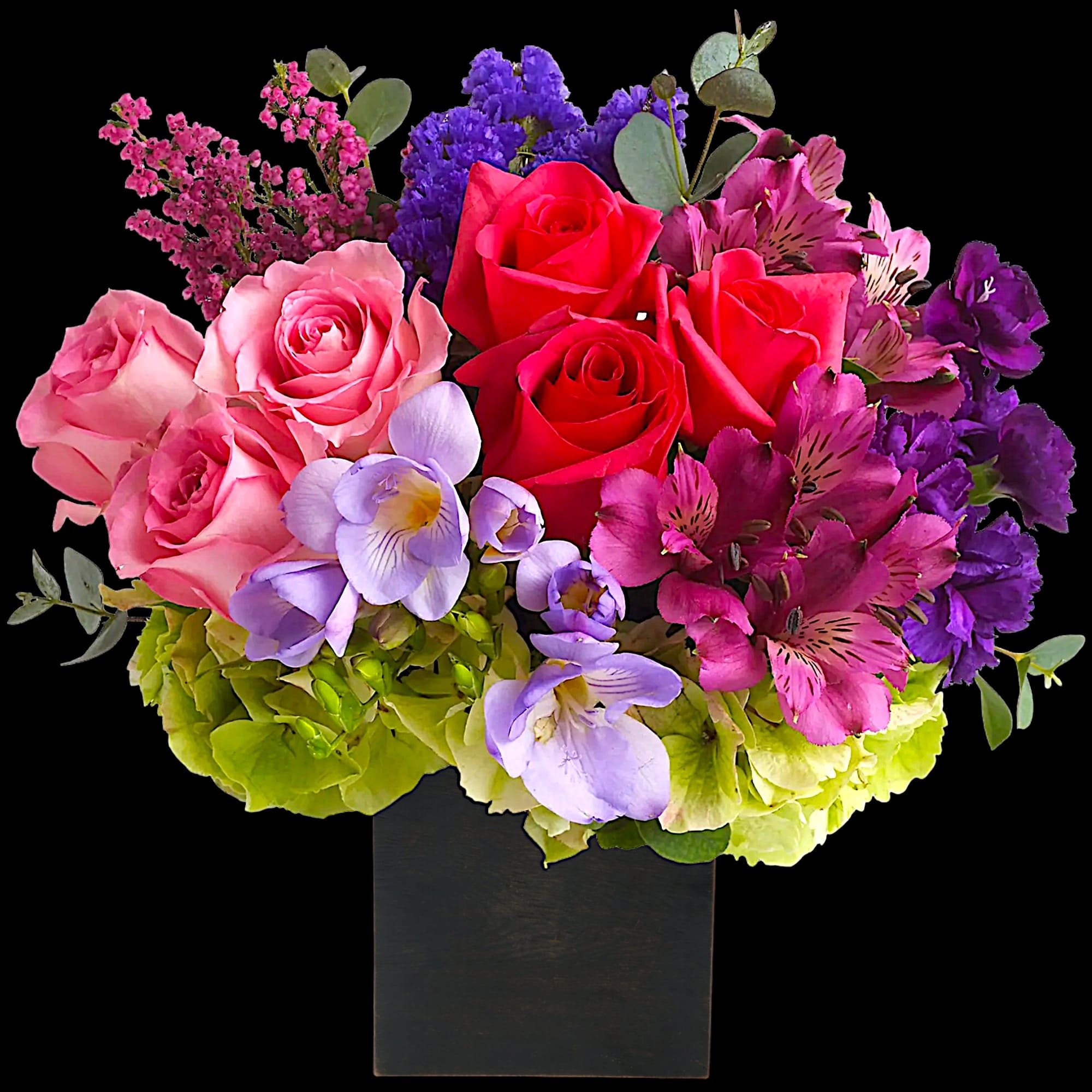 Colorful bouquet of roses, orchids, and hydrangeas in a black vase, photo 3 of 4