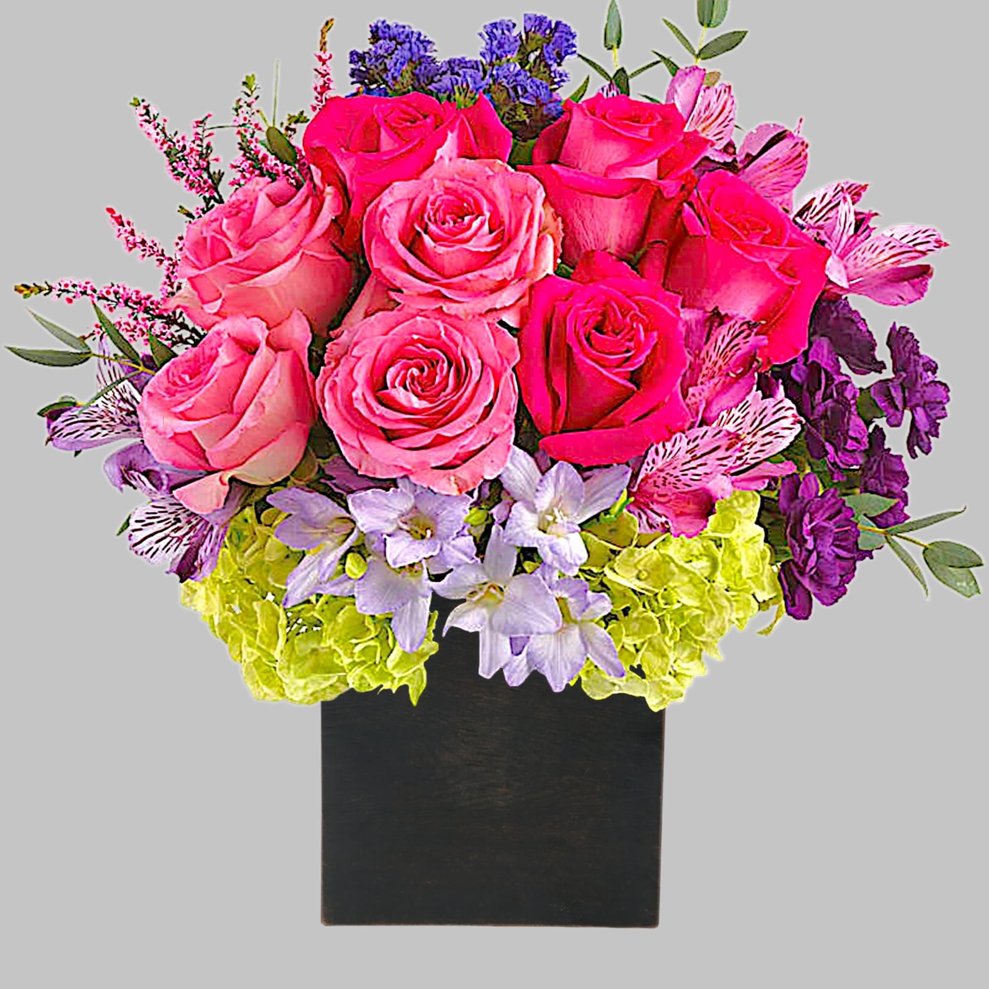 Pink and purple flower arrangement in a black square vase, photo 4 of 4