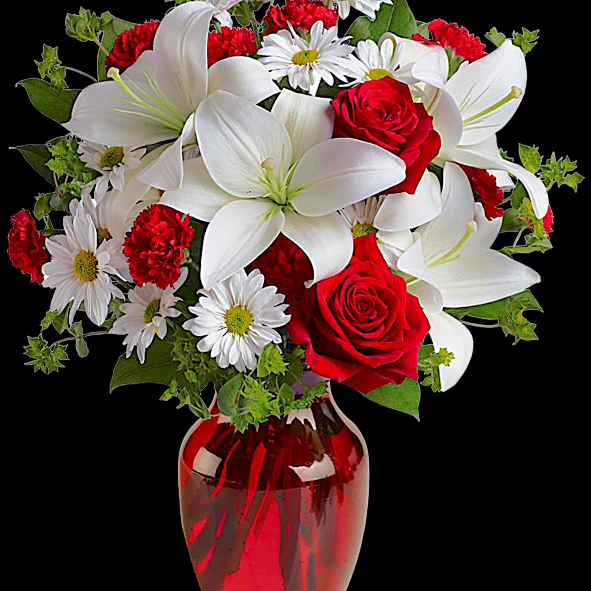 Red roses and white lilies with daisies in a red glass vase