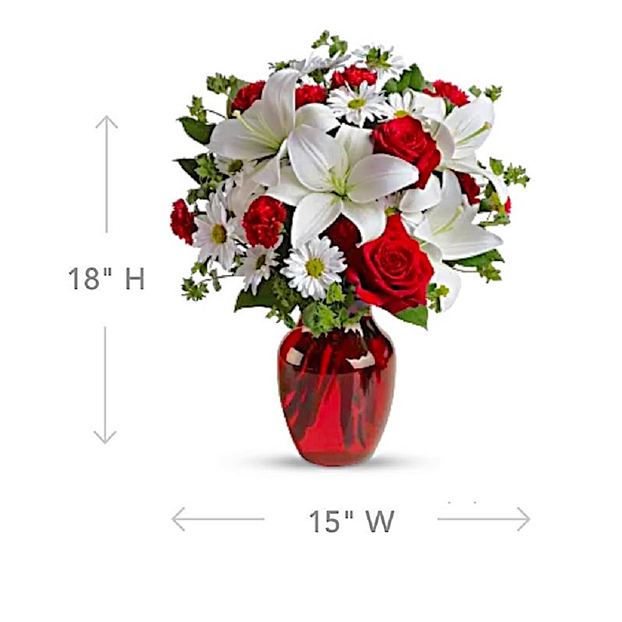 Bouquet of red roses, white lilies, and daisies in a red glass vase