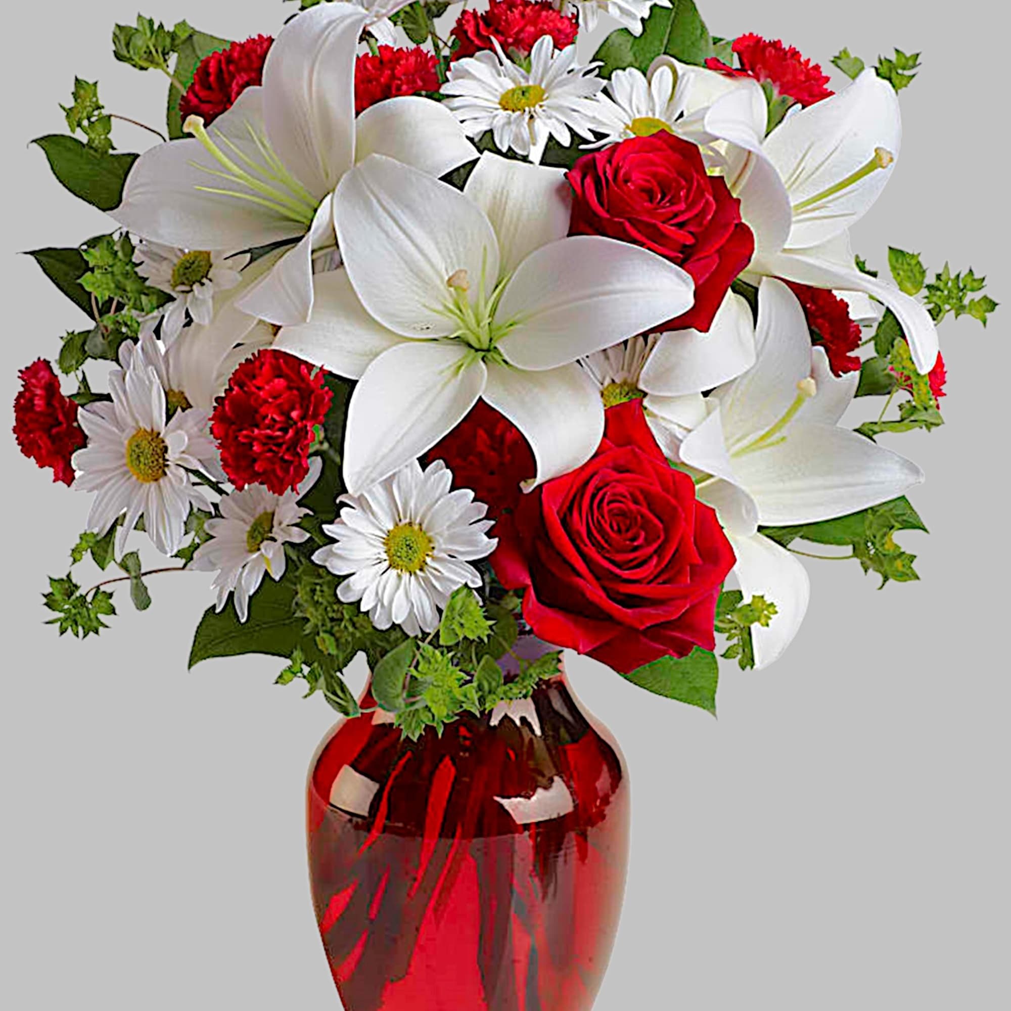 Red roses and white lilies in a red glass vase, photo 6 of 6