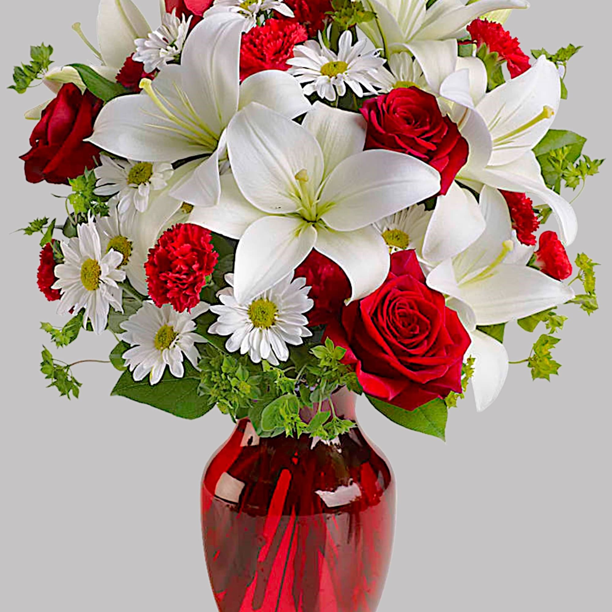 Red roses and white lilies in a red glass vase, photo 6 of 6