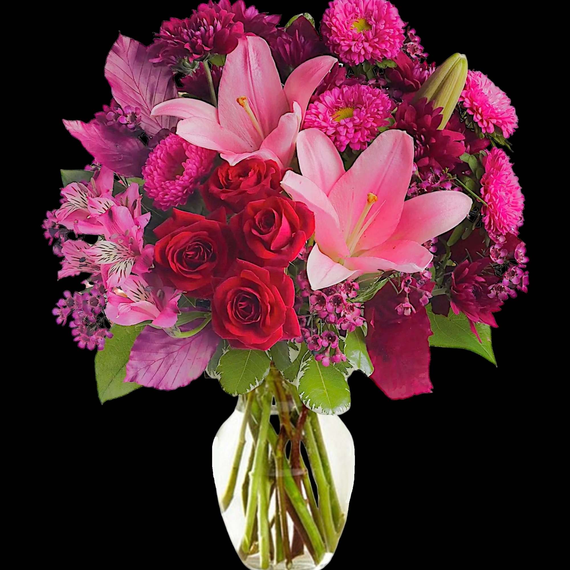 Pink lilies and red roses in a clear glass vase, photo 3 of 4