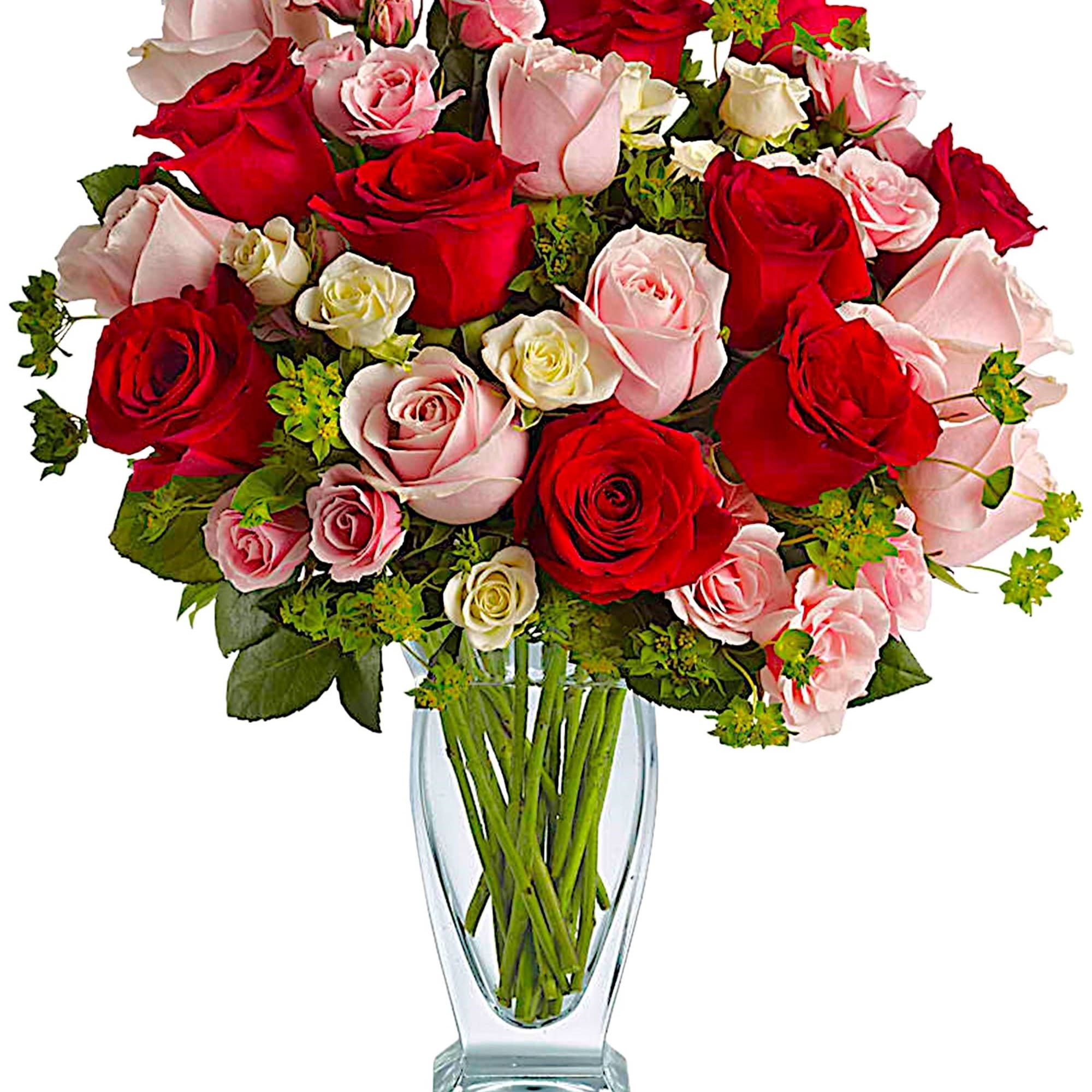 Bouquet of red and pink roses in a clear glass vase