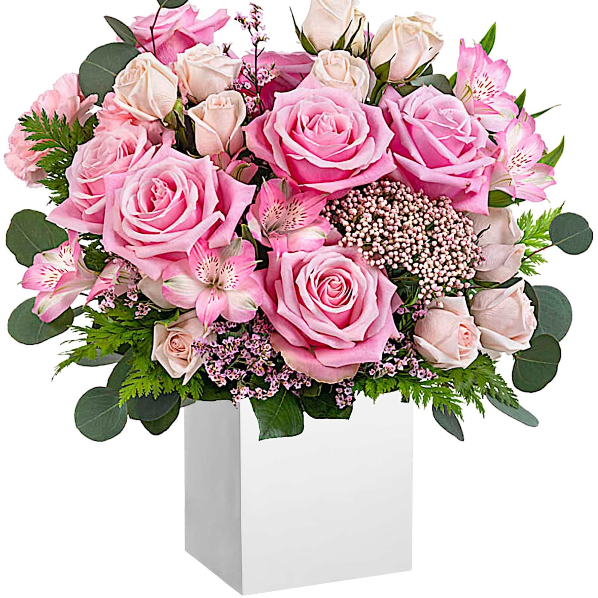 Pink and blush roses arranged in a white box