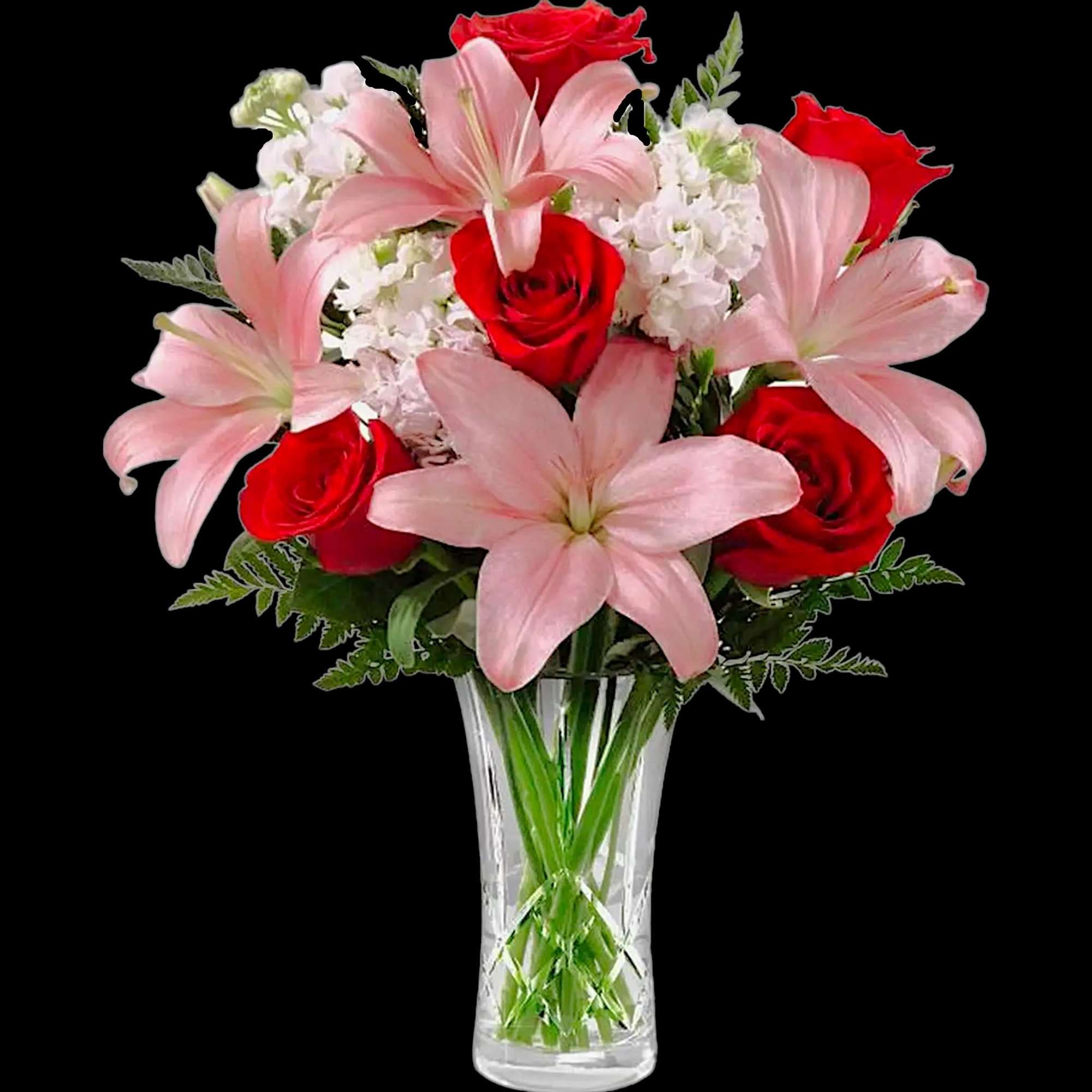 Pink lilies and red roses in a clear glass vase, photo 3 of 4