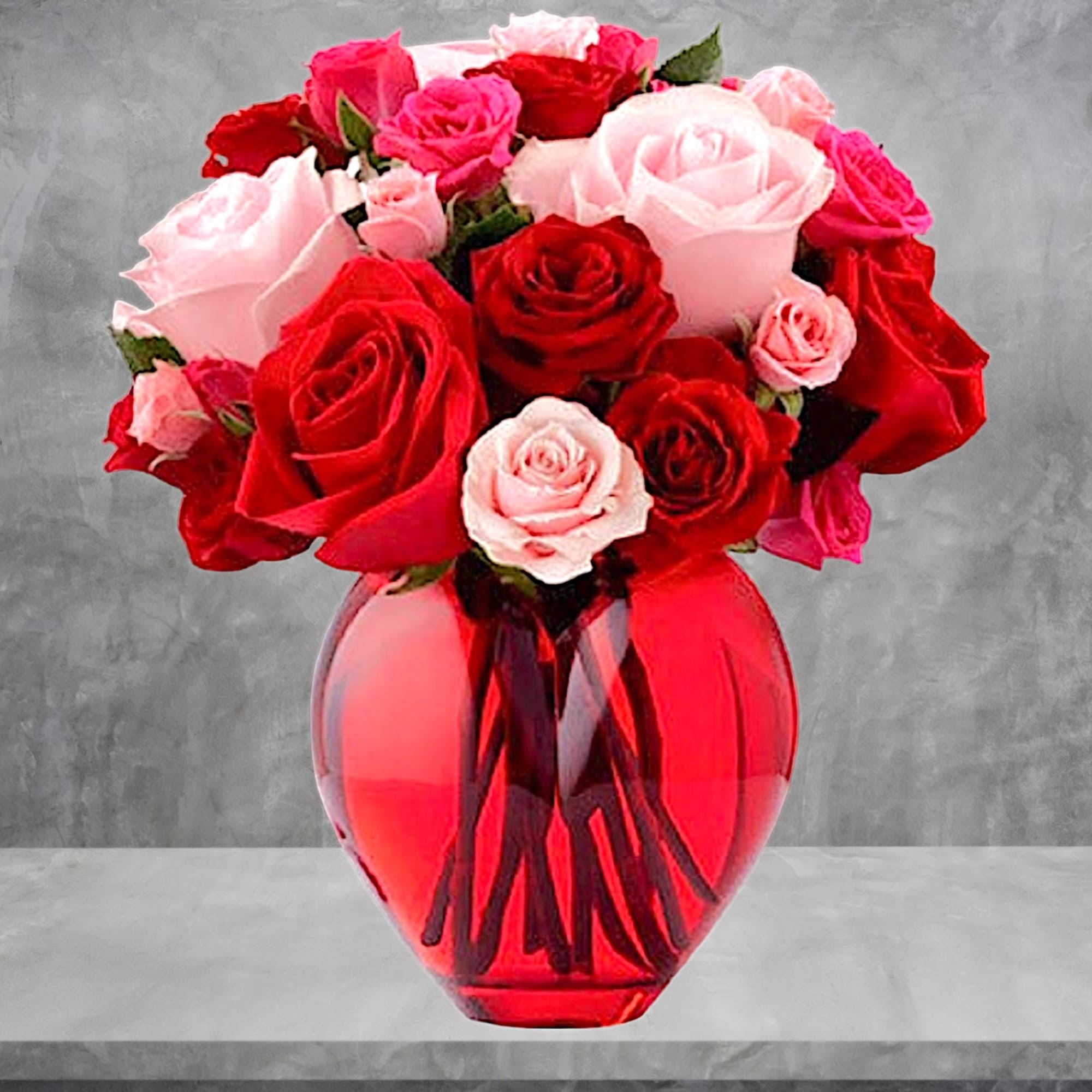 Bouquet of red and pink roses in a red glass vase, photo 3 of 5