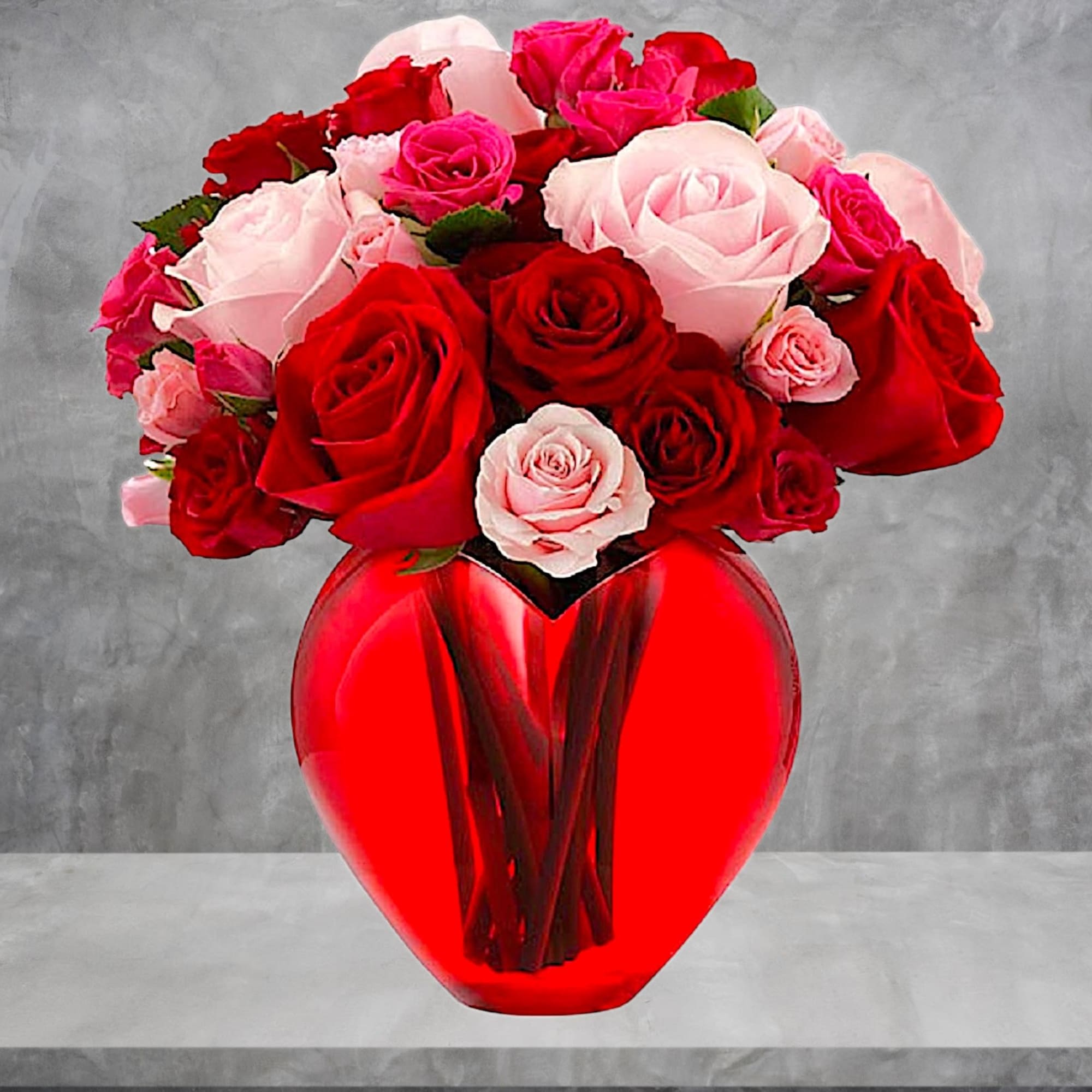 Bouquet of red and pink roses in a red glass vase, photo 3 of 5
