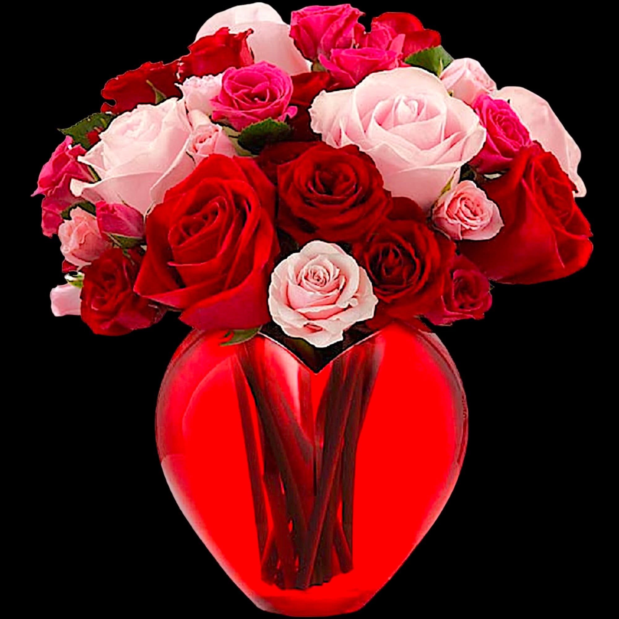 Bouquet of red and pink roses in a red heart-shaped vase