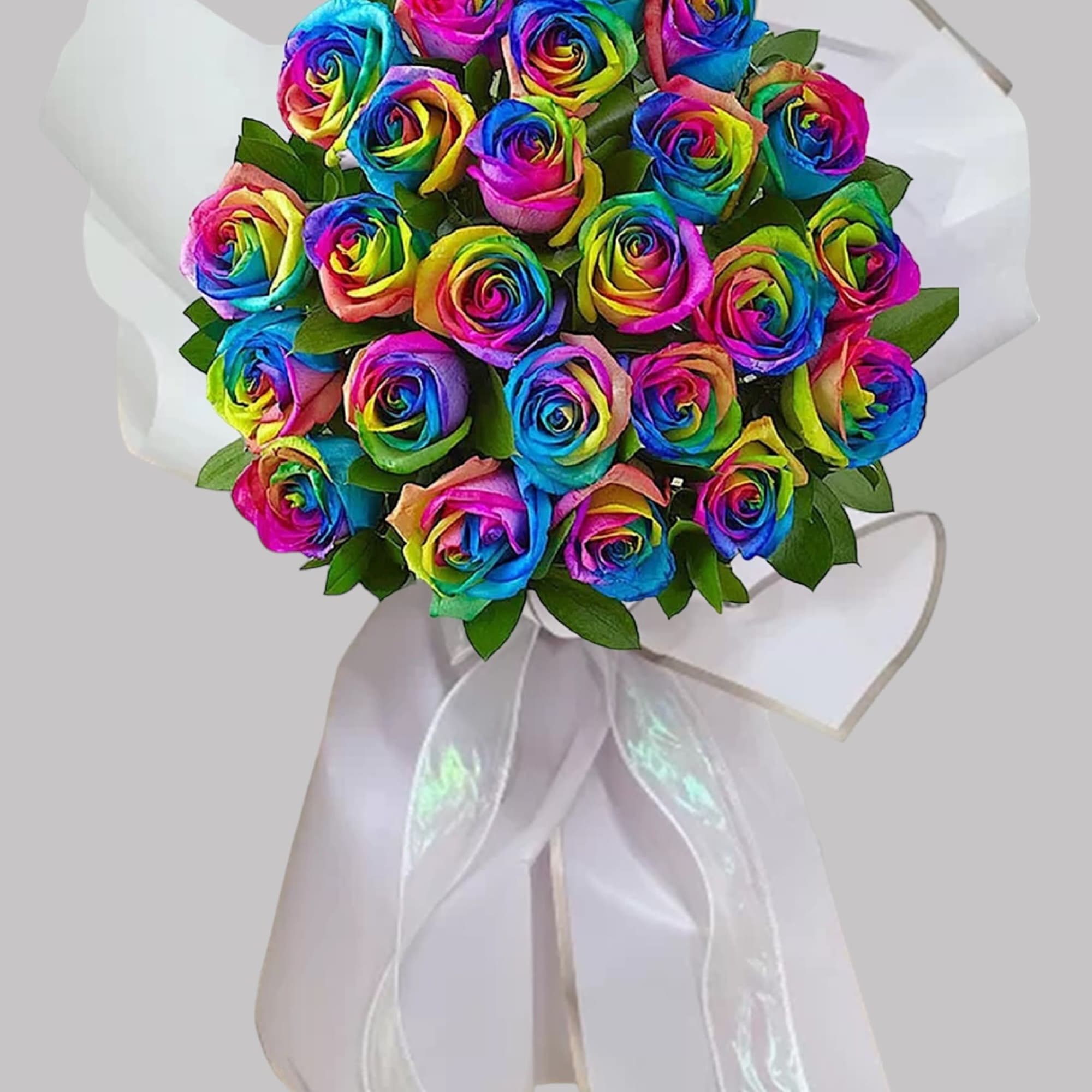Bouquet of rainbow-colored roses with a white ribbon wrap