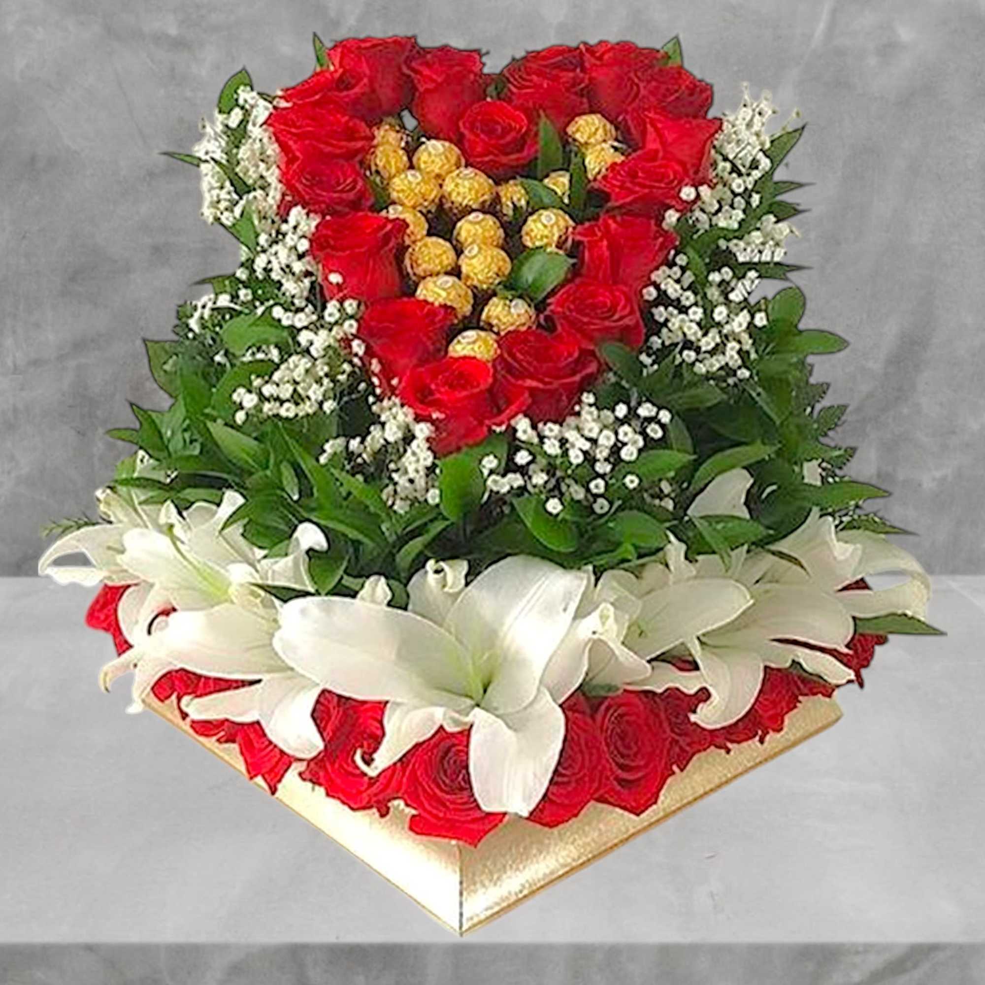 Heart-shaped arrangement of red roses with white lilies and baby's breath, photo 2 of 4