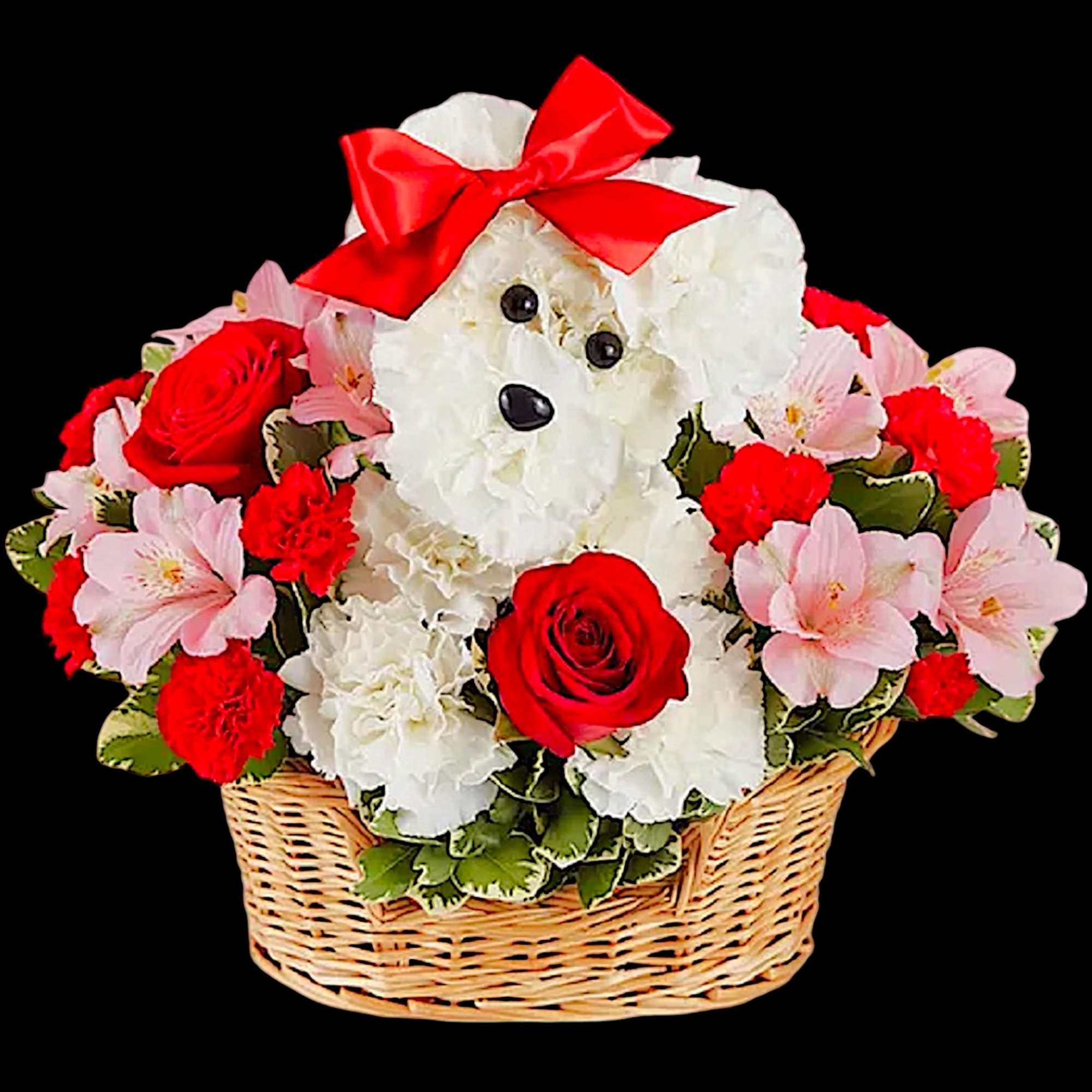 White teddy bear in a basket surrounded by red and pink flowers