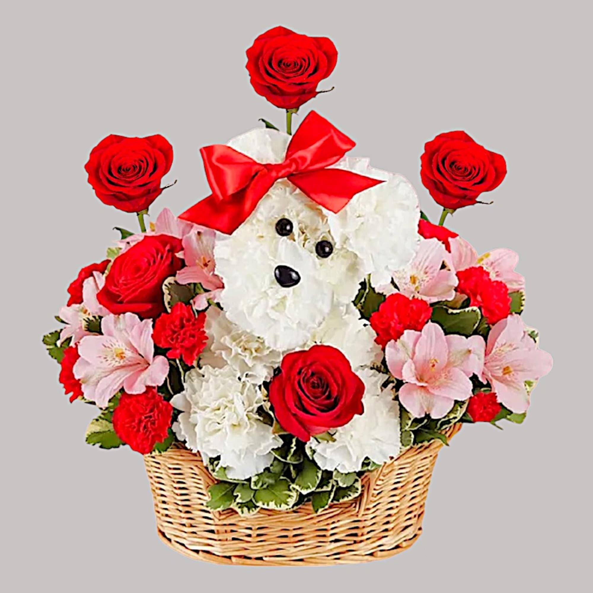 Basket arrangement with a white teddy bear, red roses, and pink flowers