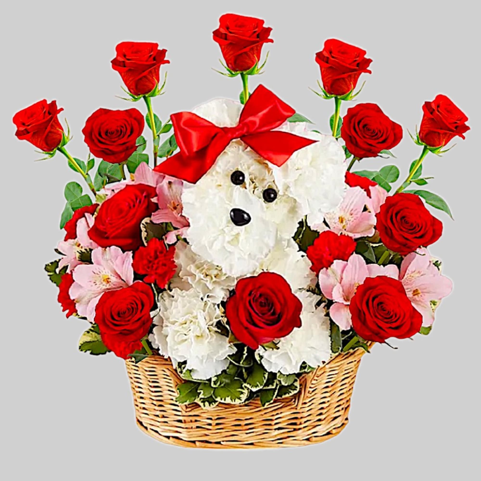 Basket arrangement with red roses, pink flowers, and a white teddy bear