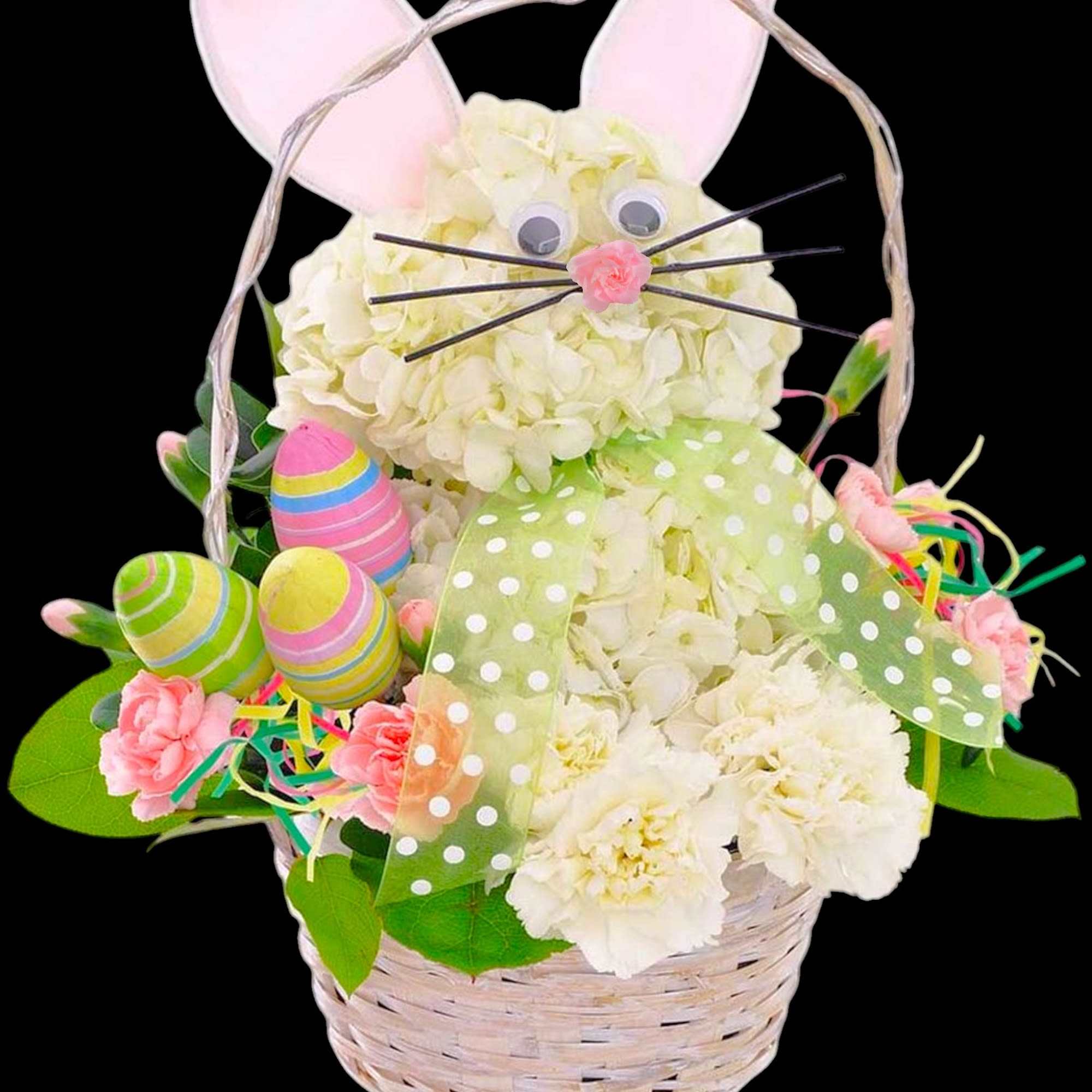 White hydrangea arrangement in a basket with bunny ears and Easter eggs