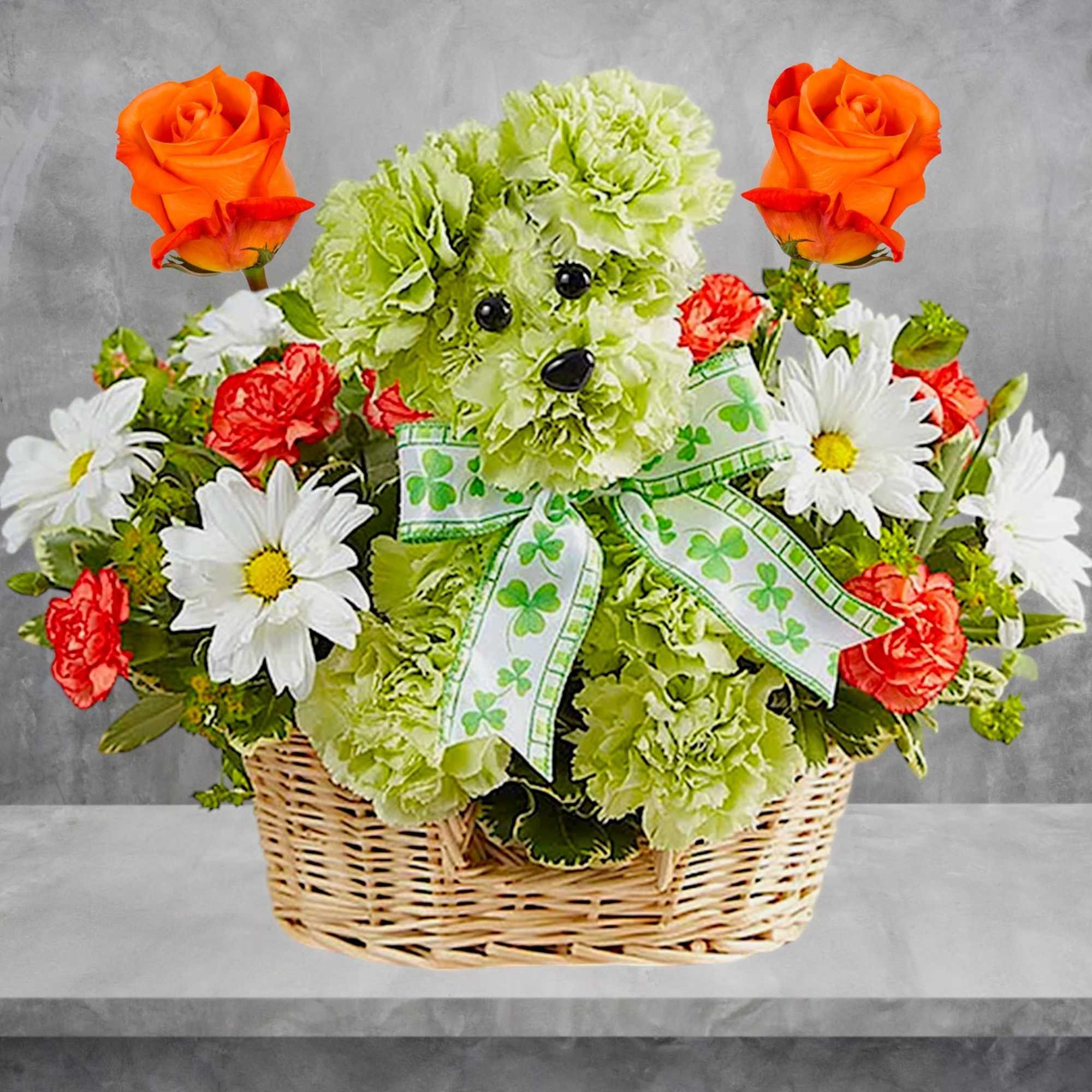 Basket arrangement with orange roses, white daisies, and green flowers shaped like a face