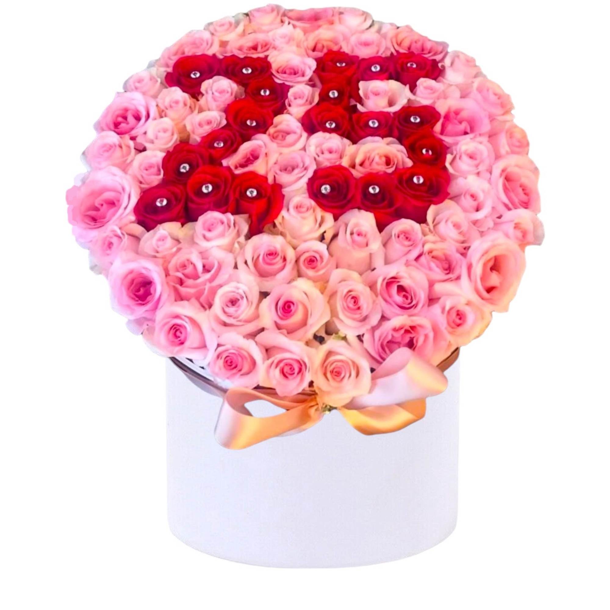 A modern flower arrangement in a Cylinder box filled with roses. Perfect