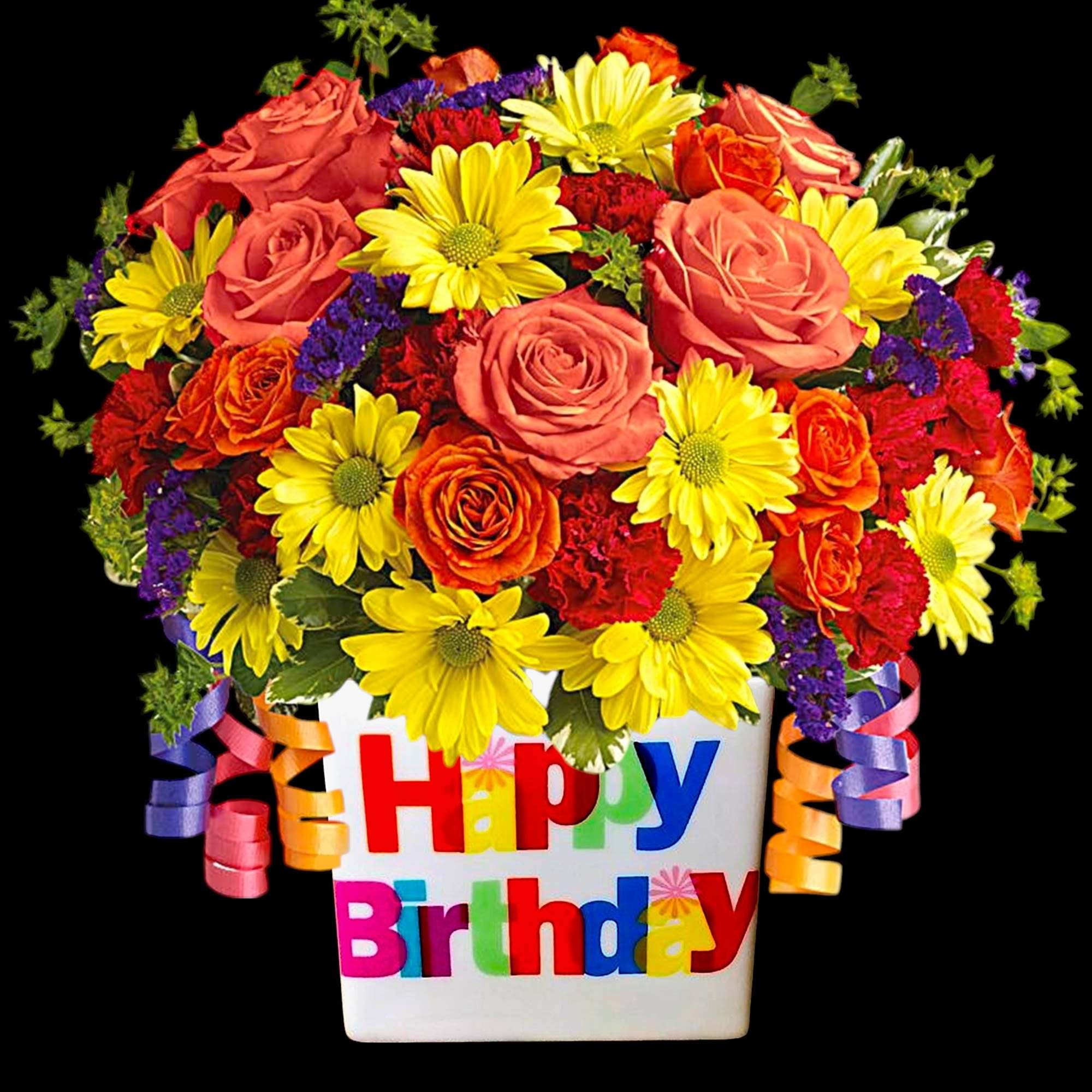 Bright mixed flower arrangement in a Happy Birthday container