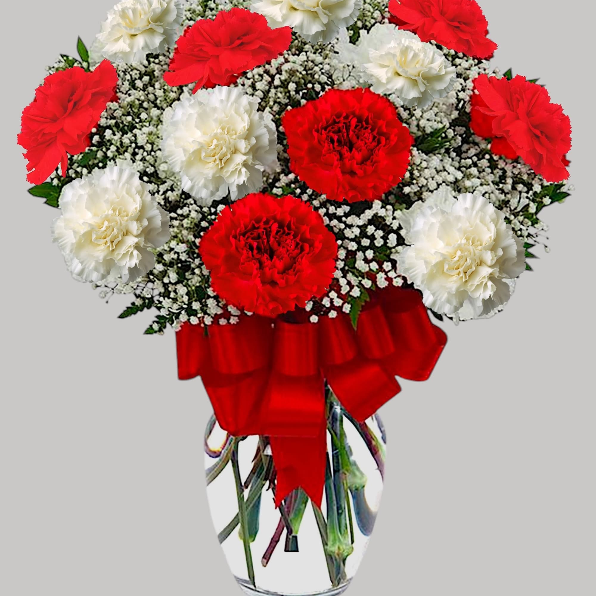 Red and white carnations in a glass vase with a red ribbon, photo 4 of 4