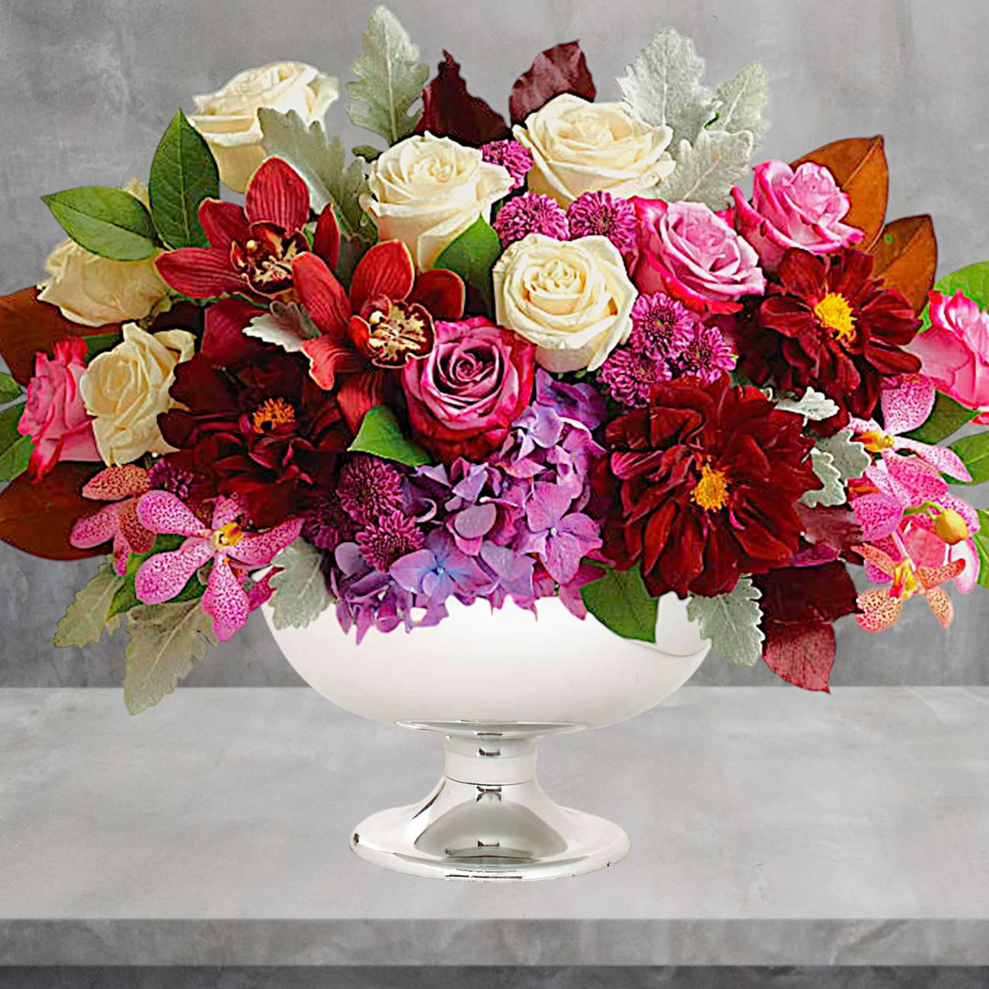 Mixed bouquet of roses and orchids in a white pedestal vase, photo 2 of 4