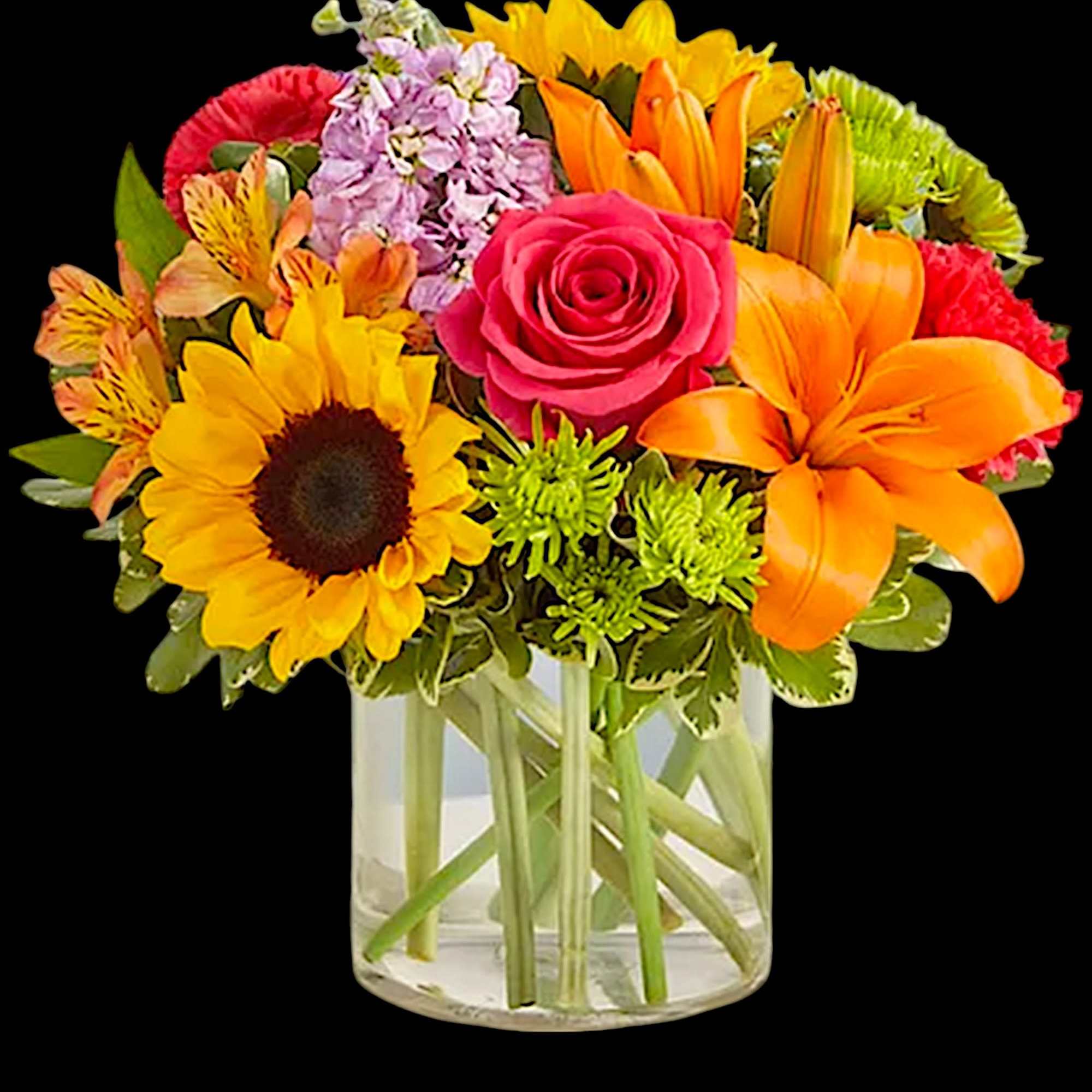 Mixed bouquet with sunflowers, roses, lilies, and a glass vase