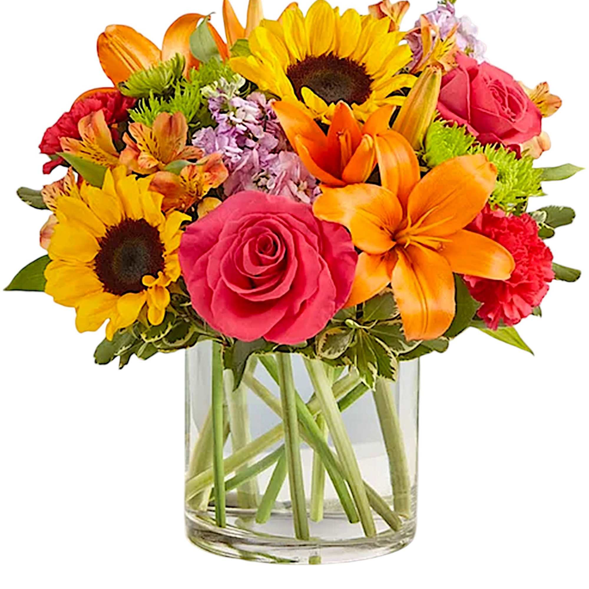 Colorful bouquet of roses, sunflowers, lilies, and carnations in a glass vase